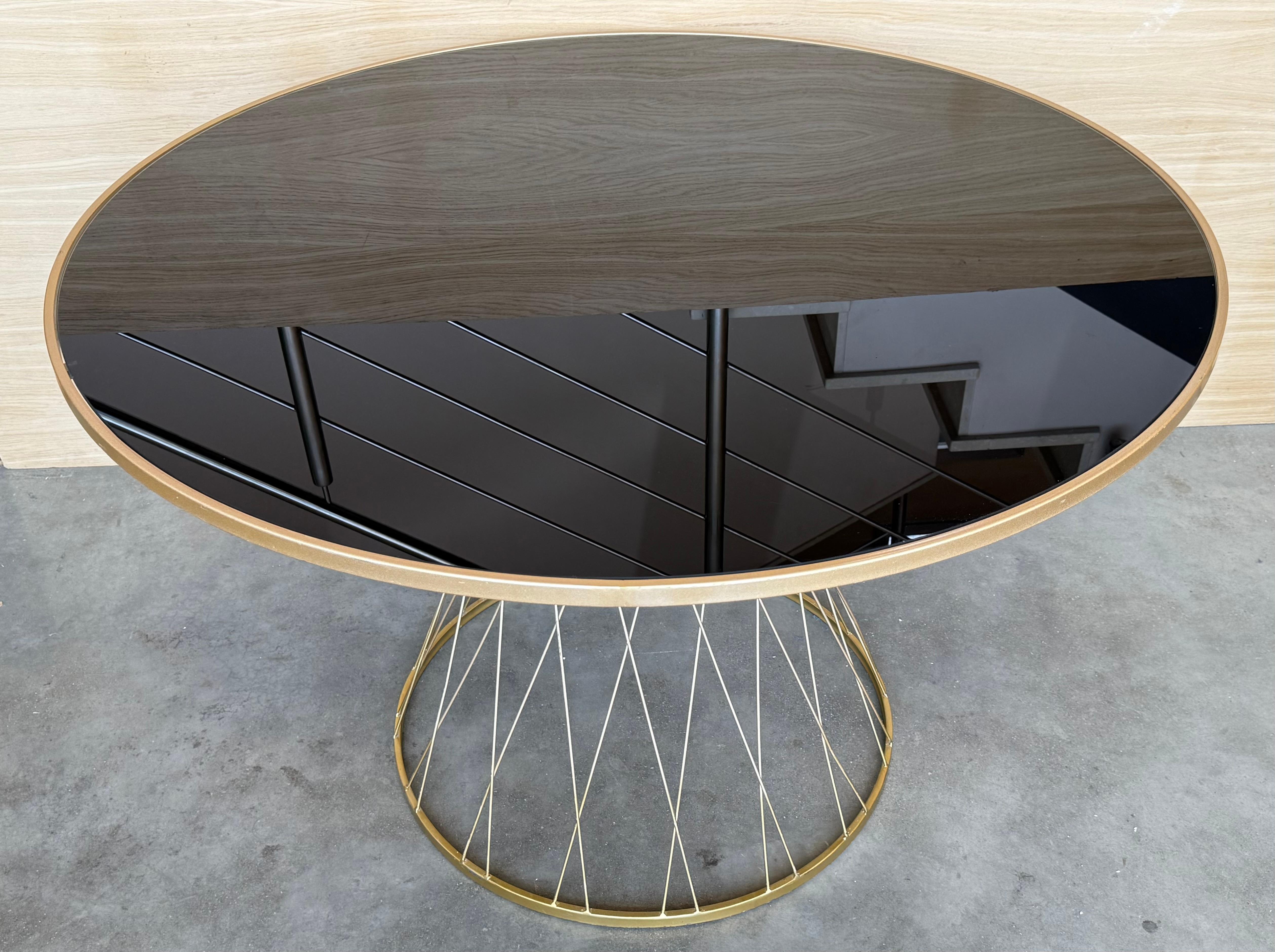 Mid Century Modern Gilded Allure Style Round Dining Table with Black Glass In Good Condition For Sale In Miami, FL