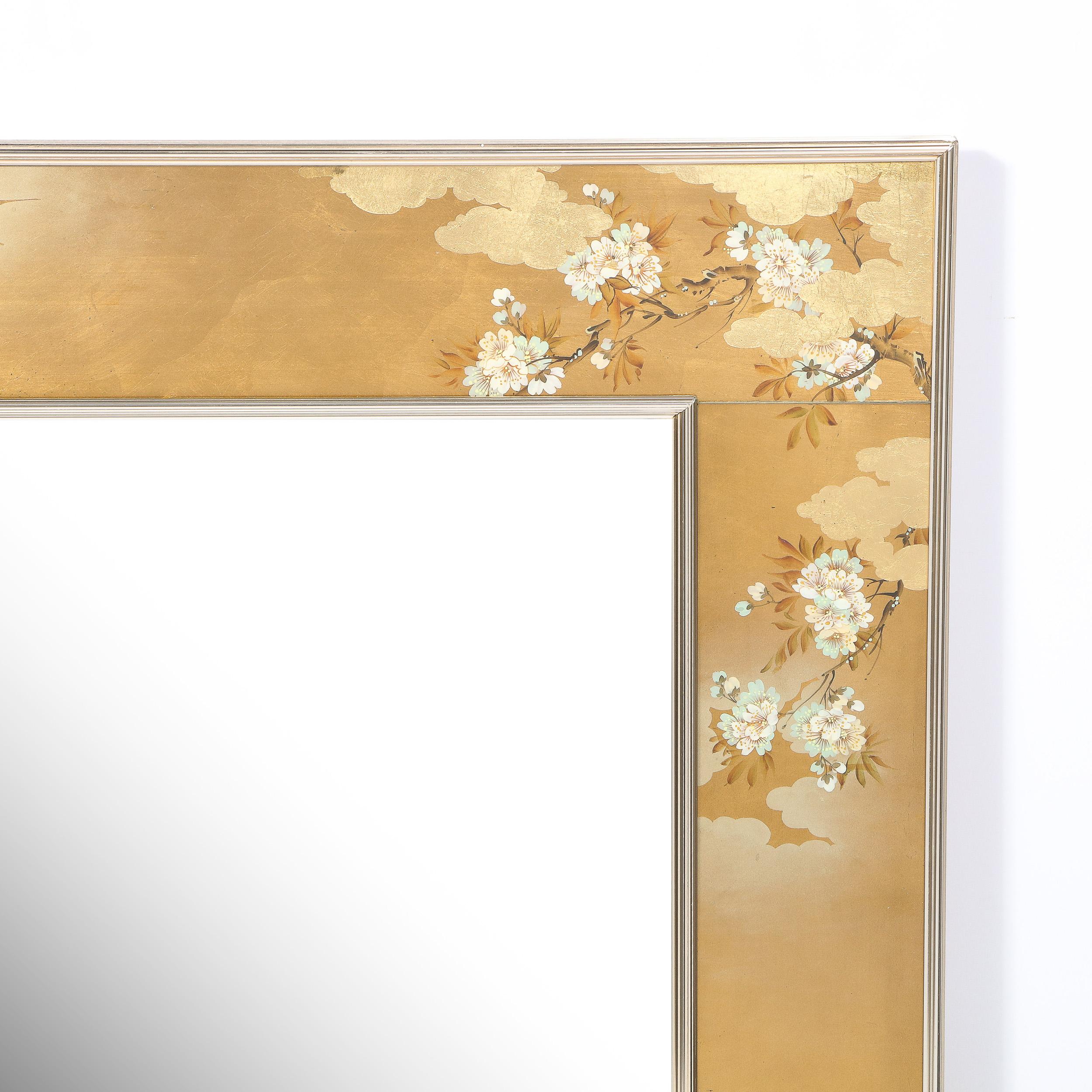 This exquisite chinoiserie reverse hand painted glass, gilt and églomisé mirror was realized by the esteemed American producer, La Barge, circa 1980. The piece features two chromed and reeded rectangular frames with a gilded hand painted chinoiserie