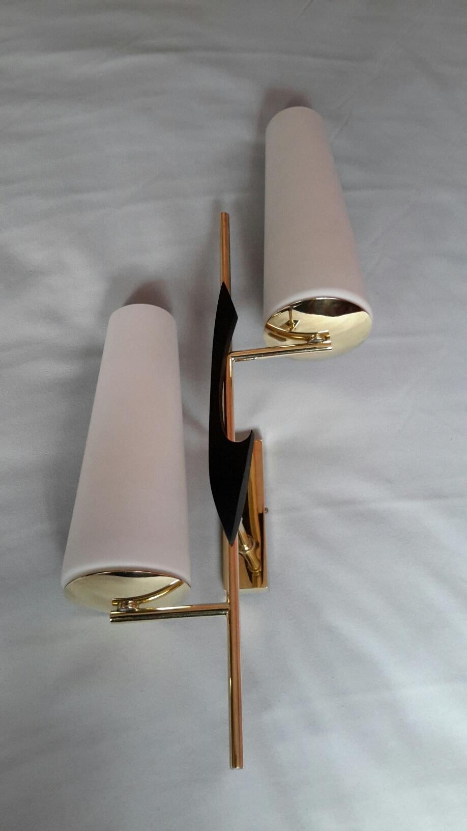 Gorgeous and large pair of asymmetrical double Mid-Century Modern sconces 1950s, by French Maison Lunel.
In brass, black stone element, and white satin opaline glasses.
The sconces are in superb condition, electric parts have been renewed