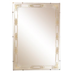 Mid-Century Modern Gilt Églomisé Floating Mirror with Stylized Arabesque Details