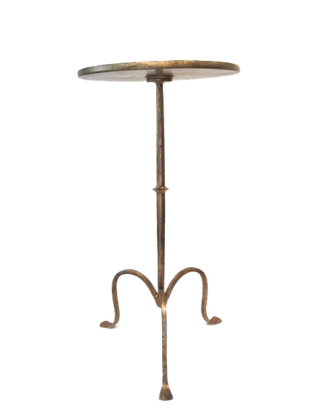 Mid 20th century gilded wrought iron side / drinks table with a dished circular top raised on a central support having a single central knop, all on a tripod base with exaggerated curved legs ending in flattened triangular feet.