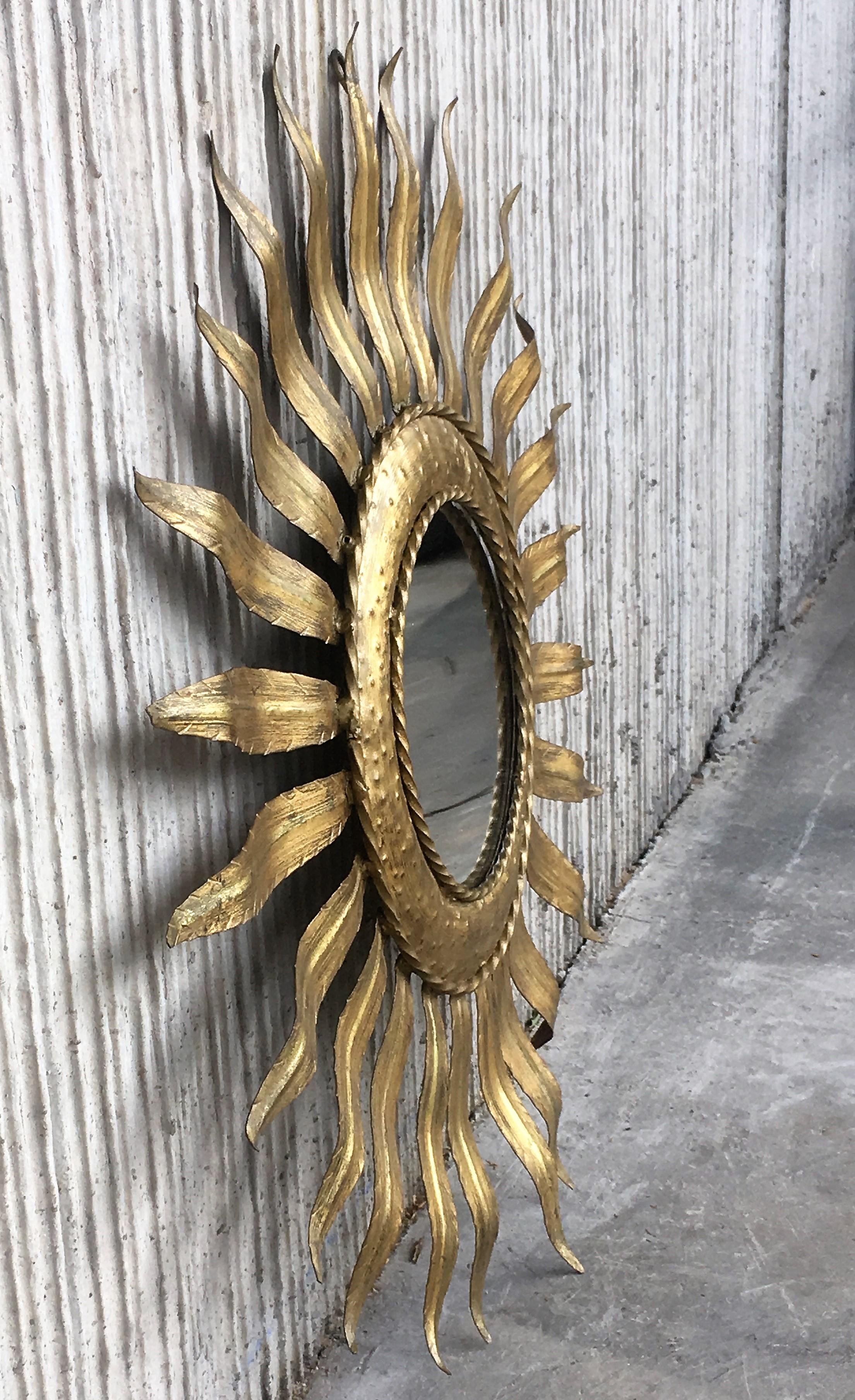 Spanish Mid-Century Modern Gilt Iron Layered Leafed Flower Shaped Sunburst Mirror For Sale