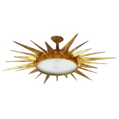 Mid-Century Modern Gilt Iron Sunburst Ceiling Light Fixture and Sunburst Mirror