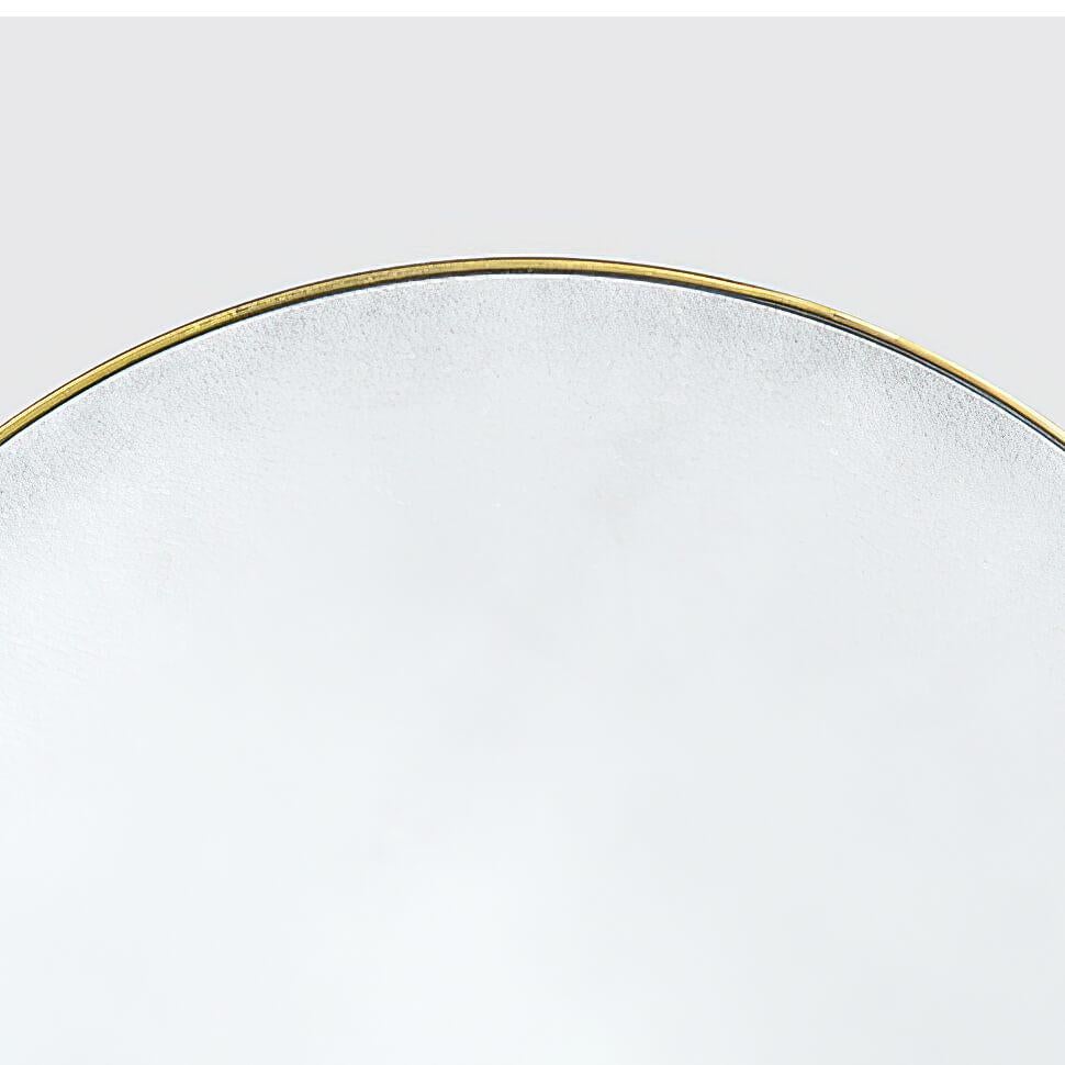 Miroir mural à cadre métallique rond, finition bronze vieilli, Mid-Century Modern, avec une plaque de verre antiquité.

Dimensions : 32