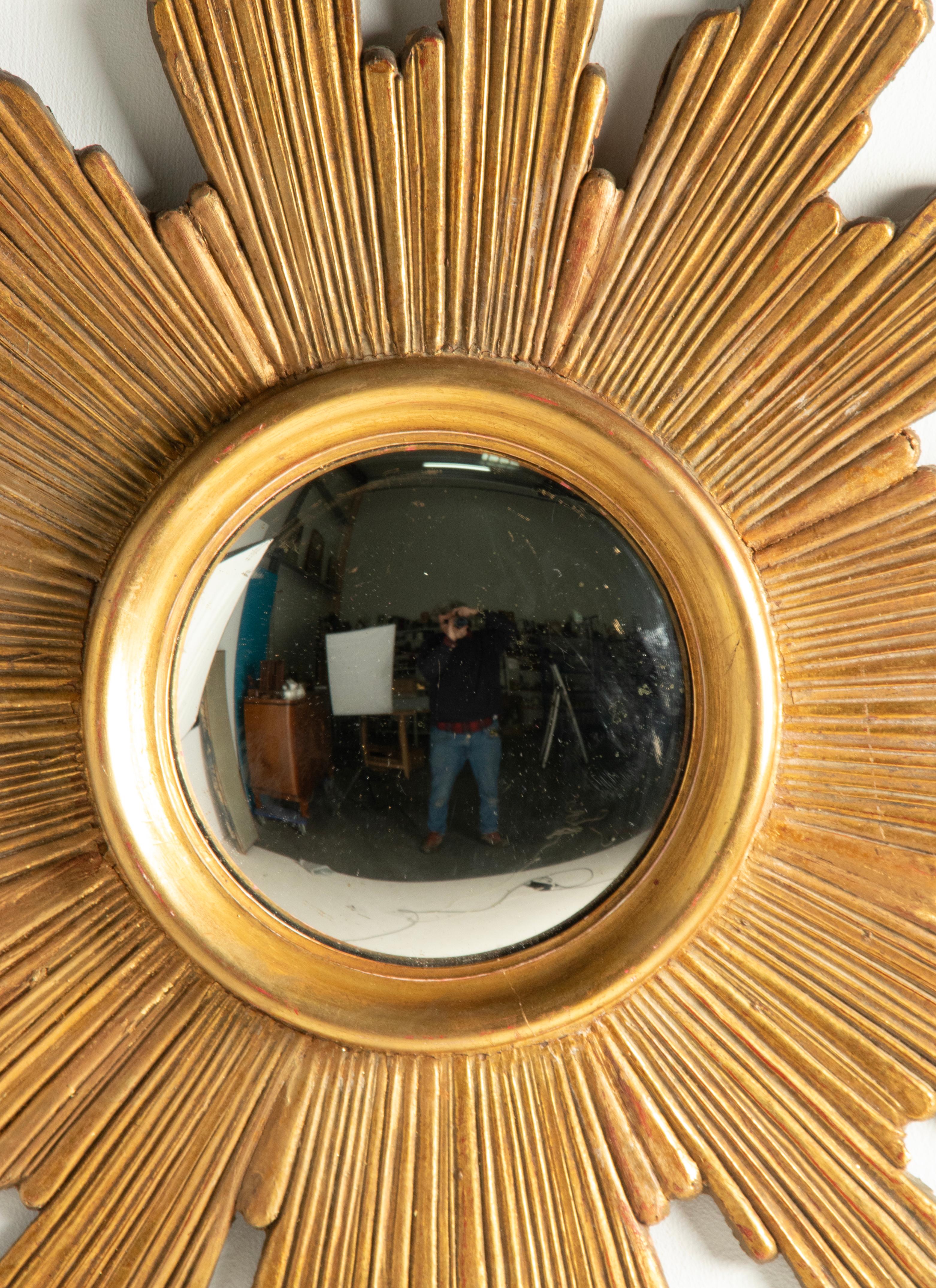 Wood Mid-Century Modern Giltwood Carved Convex Sunburst Mirror For Sale