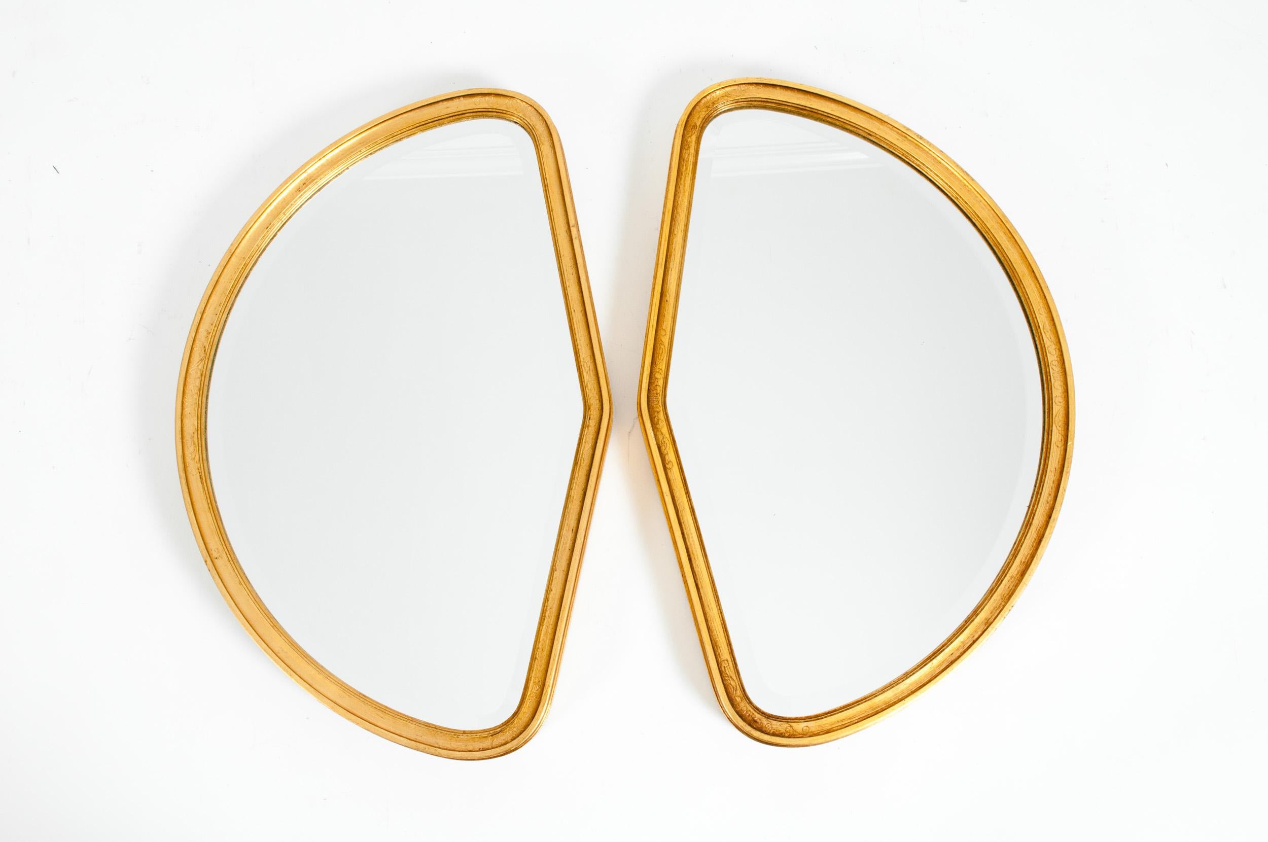 Mid-Century Modern giltwood frame with geometric shape hanging pair wall mirror. Each mirror is in great condition with appropriate wear consistent with age / use. Each mirror measure about 25 inches long x 16 inches wide x 2 inches deep.