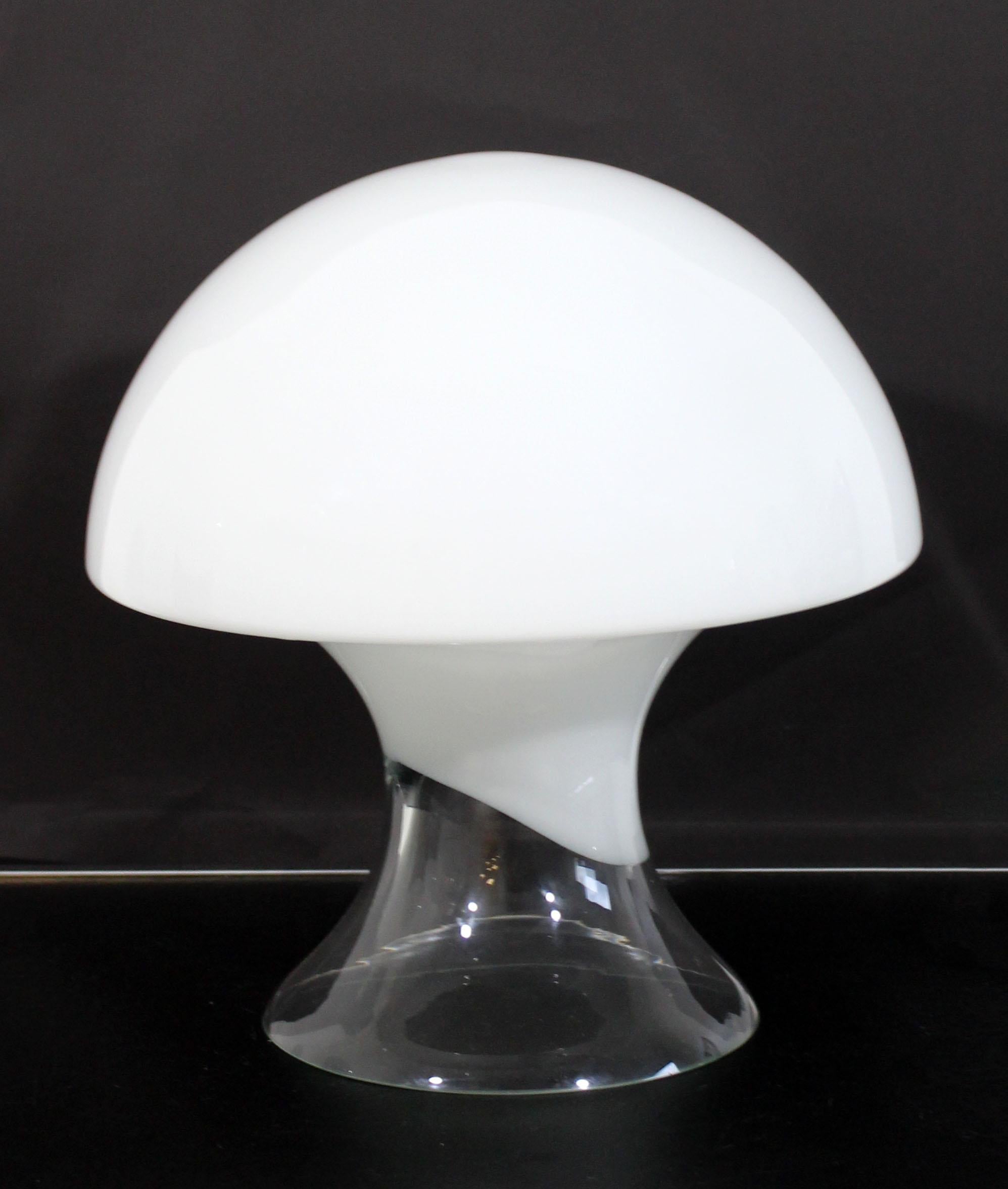 For your consideration is a fabulous, mushroom shaped table lamp, made of a single sheet of white and clear Murano glass, by Gino Vistosi, circa the 1970s. In excellent condition. The dimensions are 12