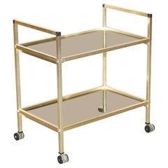 Carrello portabevande in vetro e ottone lucido della metà del secolo scorso, circa 1950