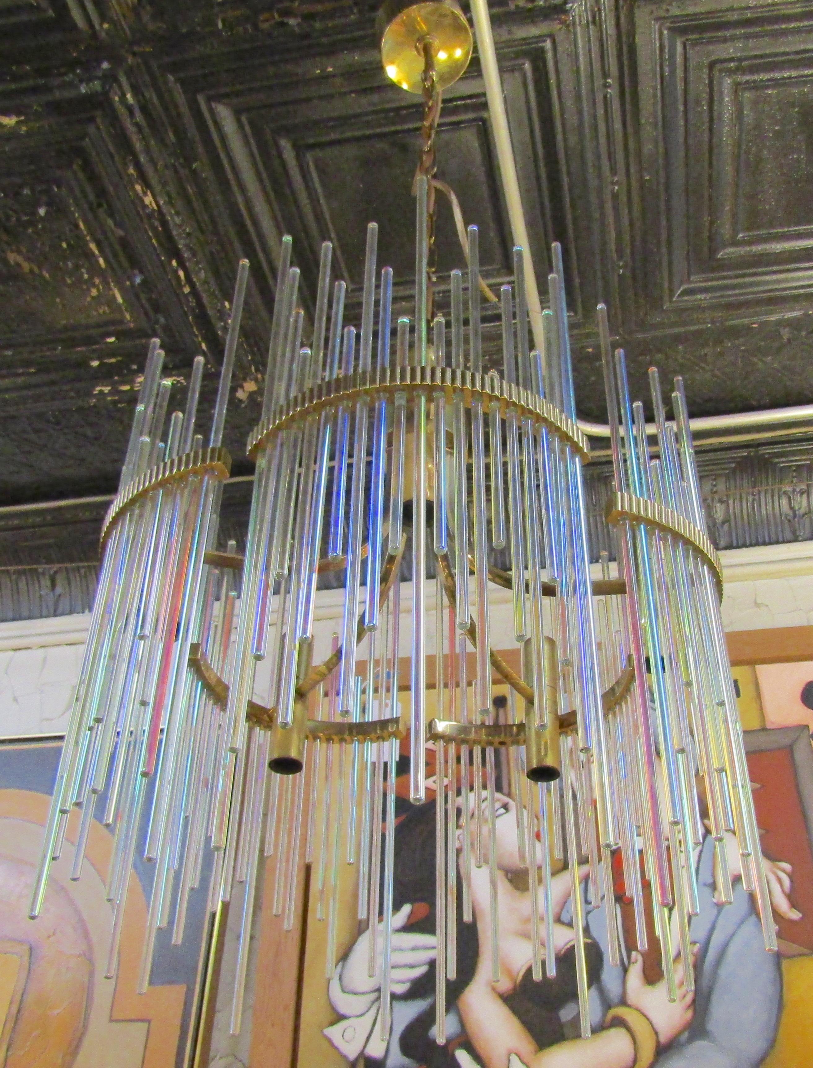 Brass frame chandelier with colored glass rods and ten sockets.
(Please confirm item location - NY or NJ - with dealer).
  