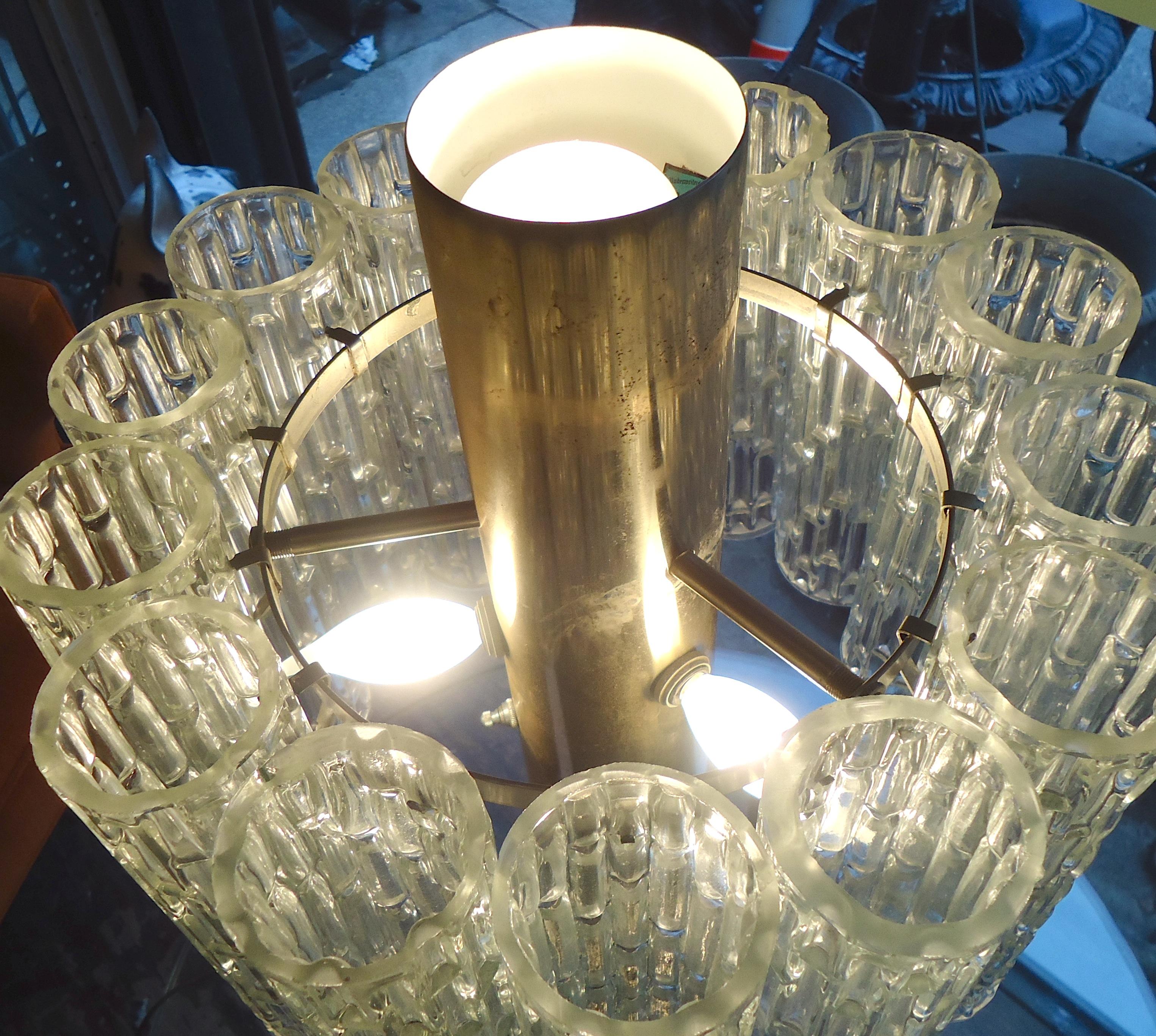 Beautiful vintage brass lamp framed with textured glass cylinders. Also has an uplight option.

(Please confirm item location - NY or NJ - with dealer).
   