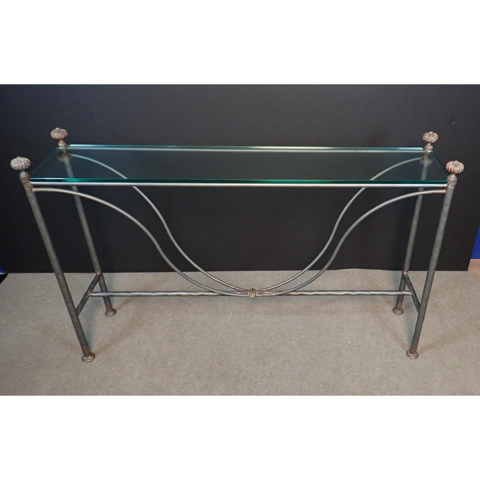 Mid-Century Gun Metal Patina Modern Glass Top Iron Console Table. Glass top wrought iron console table. Elegant design and tailored narrow lines.