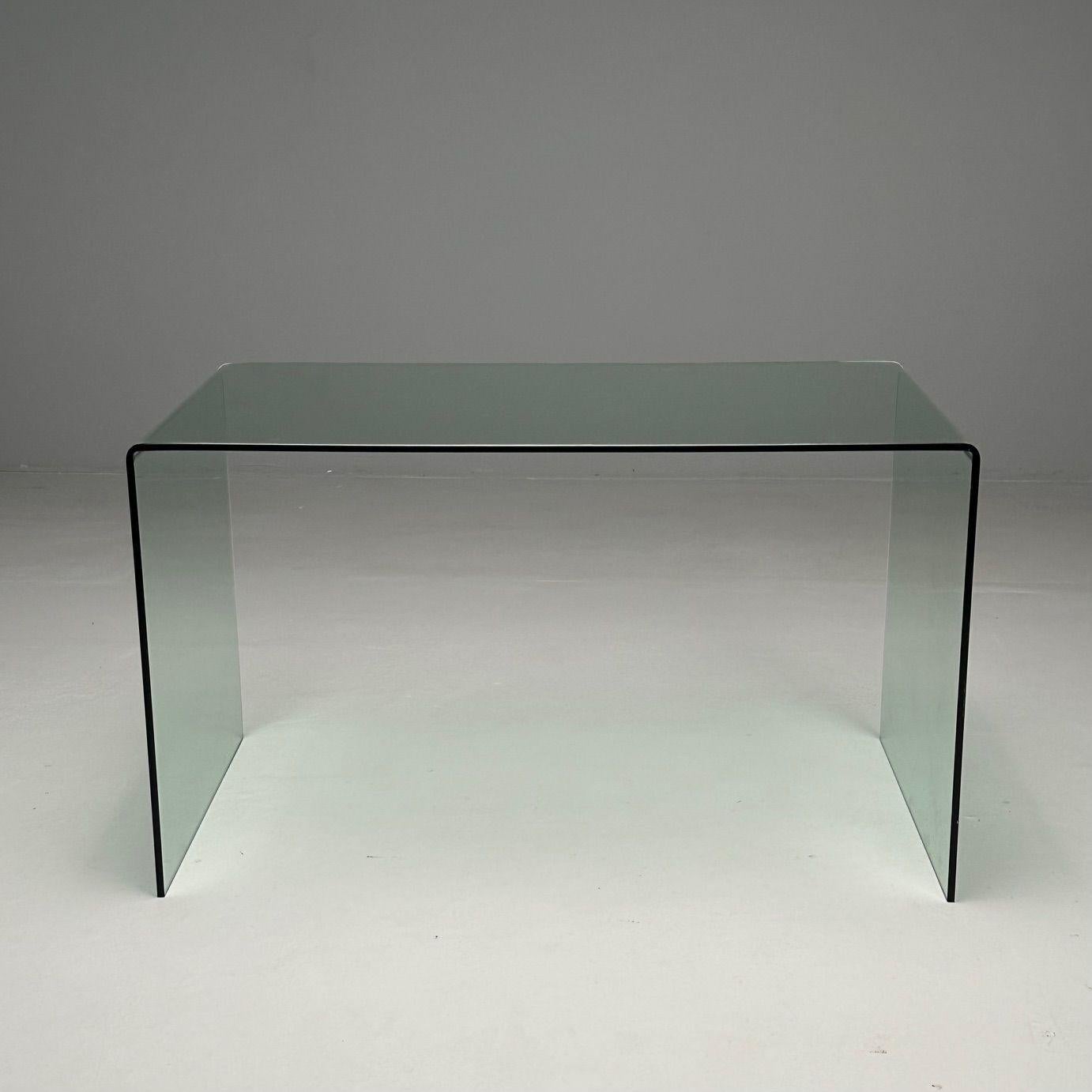 Mid-Century Modern, Glass Waterfall Console Table, American

Vintage waterfall console table in solid quarter inch thick glass designed and produced in the United States circa 1990s

Glass
American, c. 1990s

Height: 29 inches, Width: 49.5 inches,