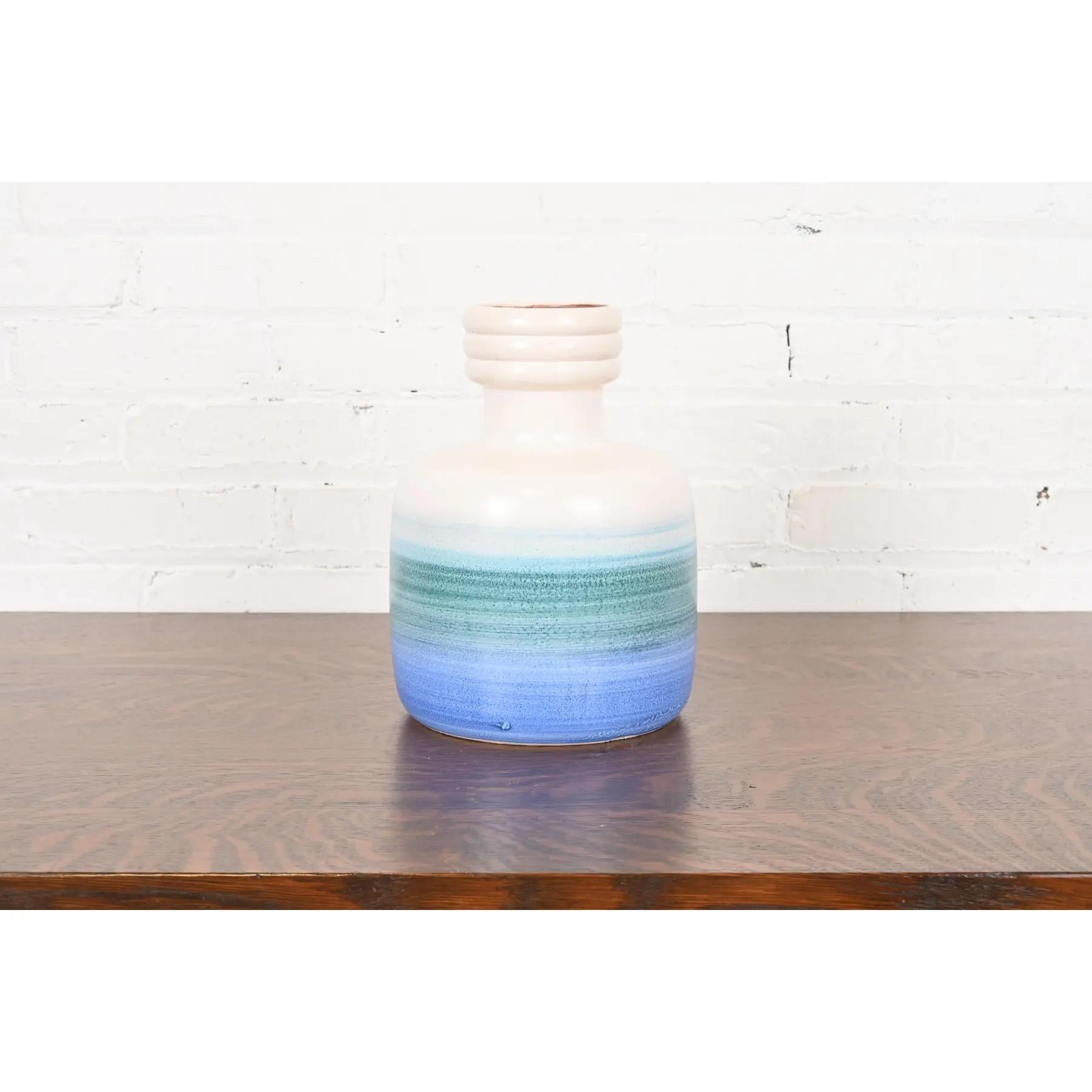 A gorgeous and rare Mid-Century Modern period glazed ceramic art pottery vase 

By Beit-Hayotser

Israel, Mid-20th Century

Measures: 8