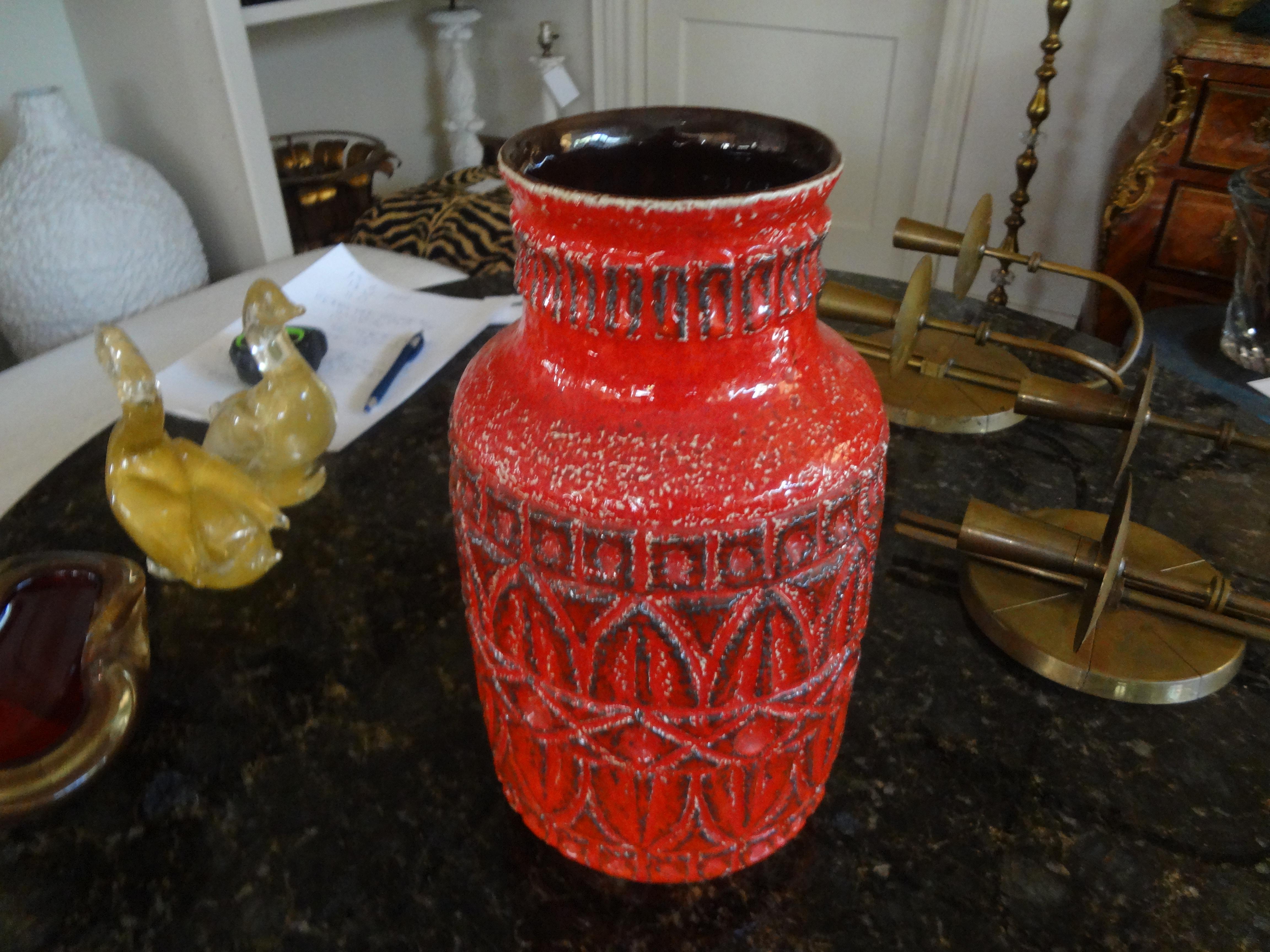 Stunning Mid-Century Modern West German tomato red glazed pottery vase with great stylized geometric design.