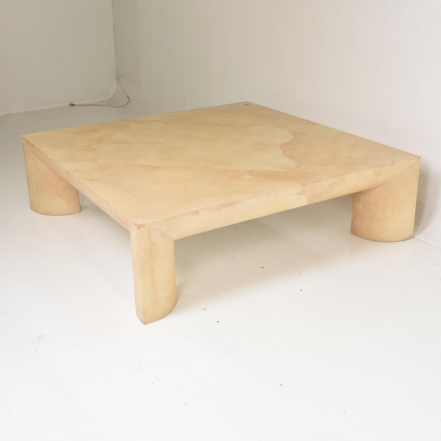 For your consideration, a Mid-Century Modern goatskin coffee table, style of Karl Springer.
Square coffee table with sculptural legs. 
Dimensions: 55 1/4