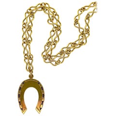 Vintage Mid-Century Modern Gold Horseshoe Pendant Necklace