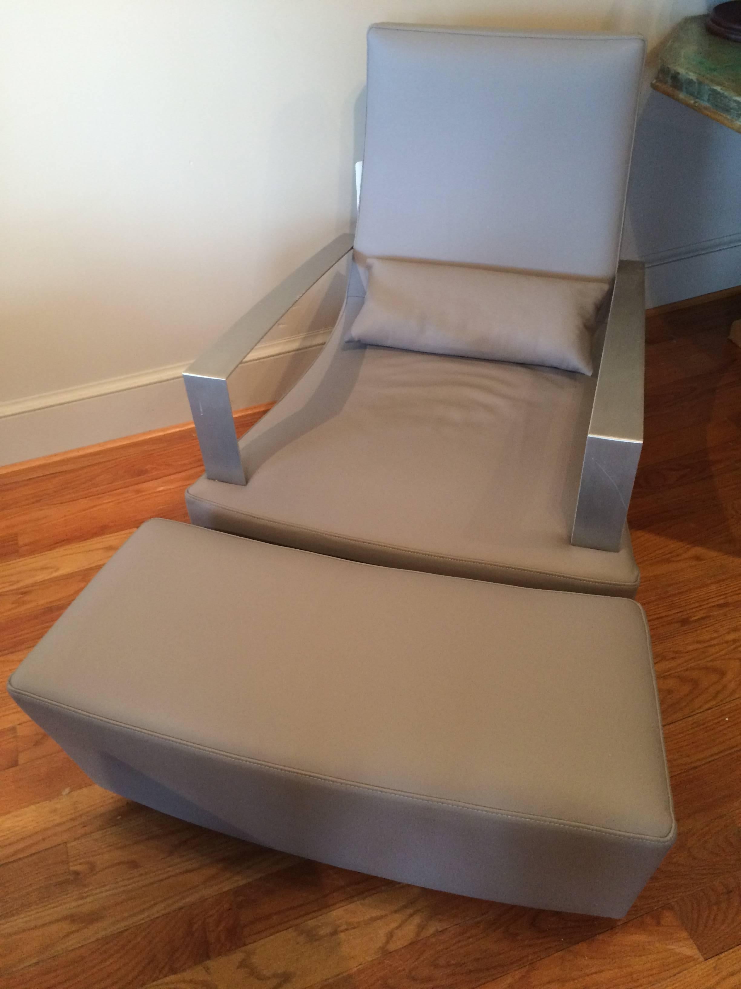 American Mid-Century Modern Gray Leather Armchair and Ottoman with Brushed Steel Arms For Sale
