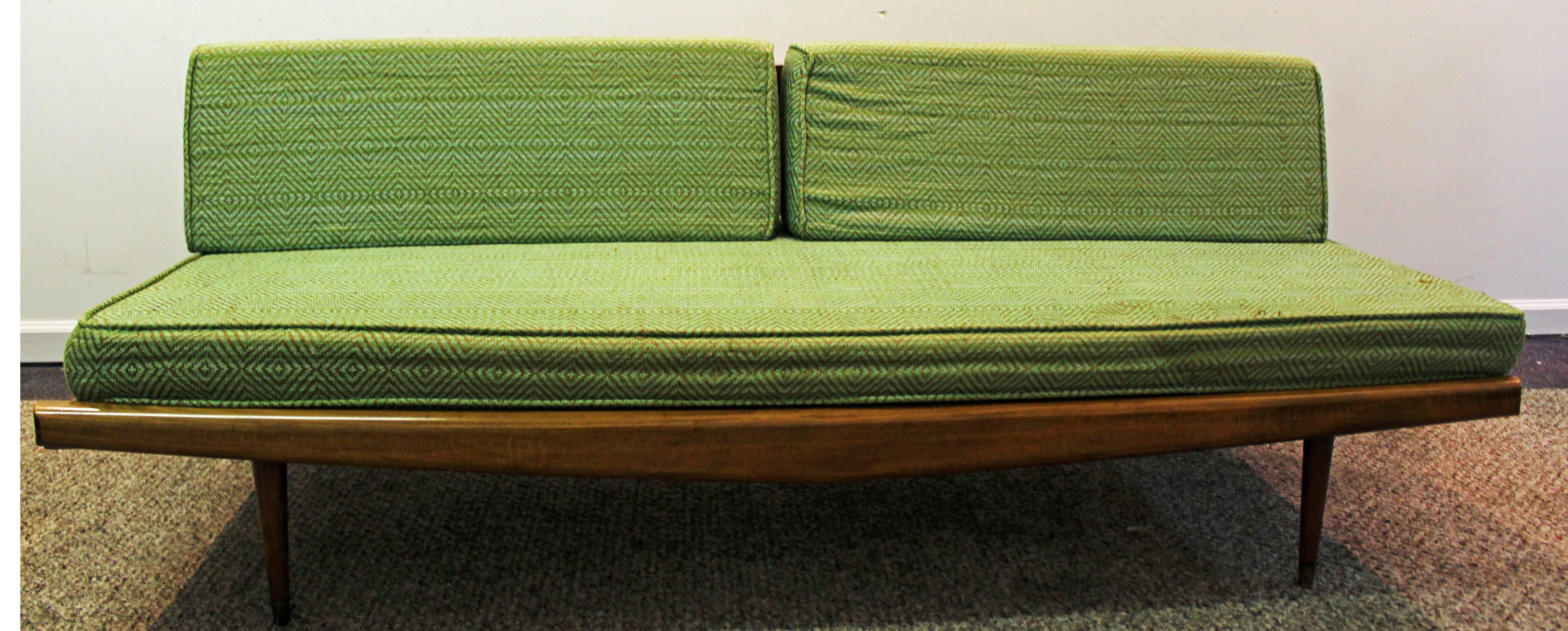 Offered is an original Adrian Pearsall sofa #992 with green upholstery and a wooden base.