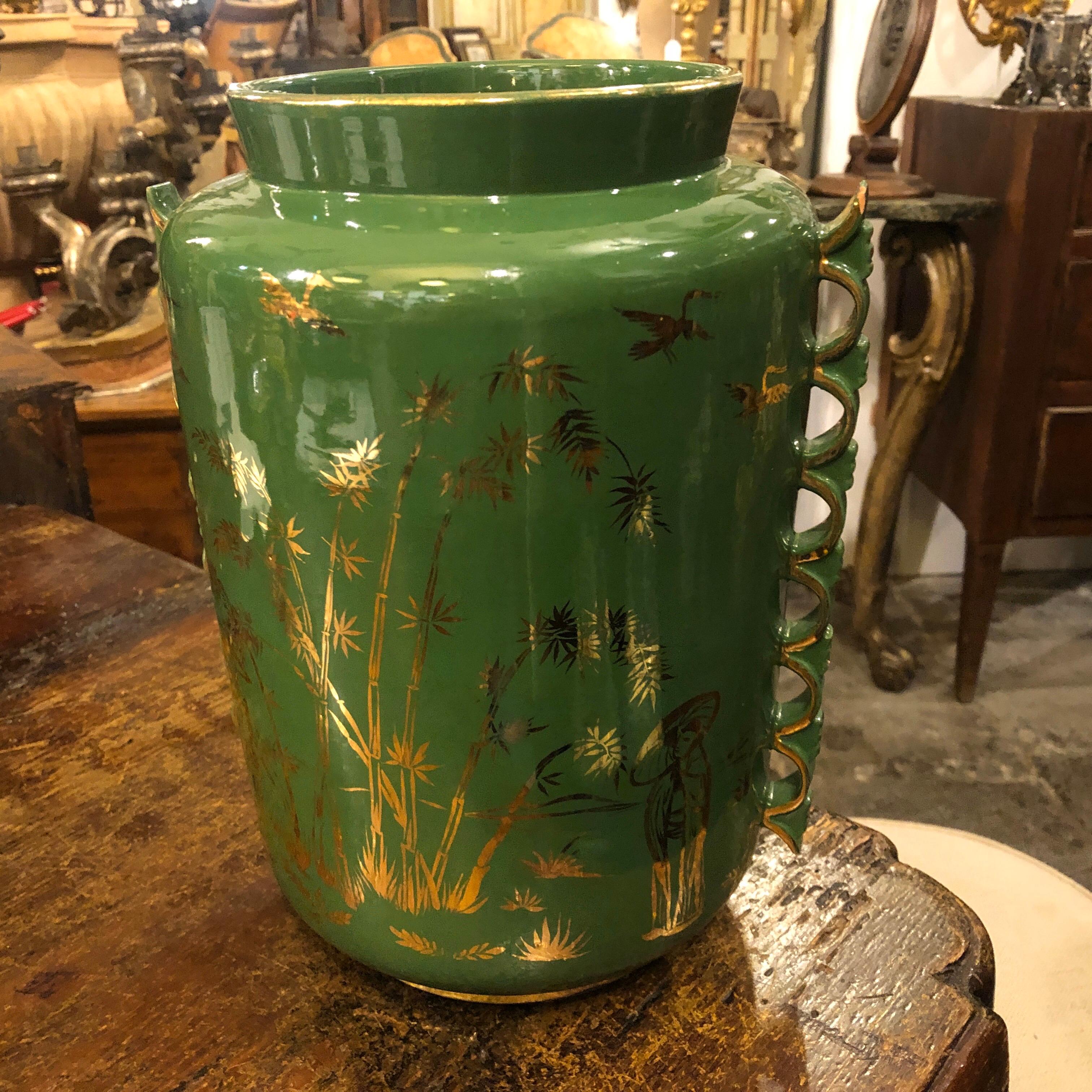 An oriental decorated vase made in Italy in the 1960s. Green and gold ceramic is in good condition. Only a little chip on the bottom not visible. Attributed to Italo Casini.