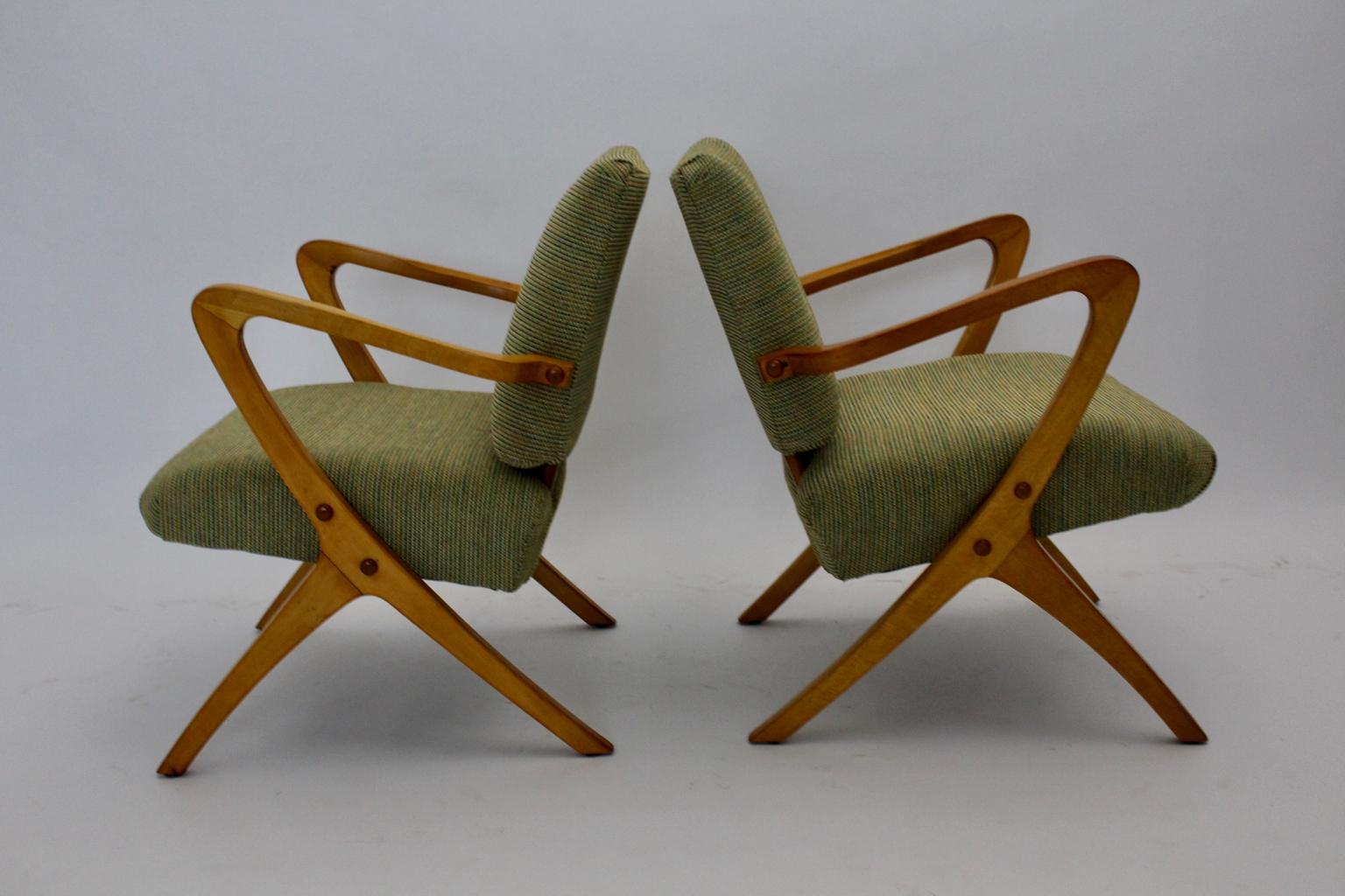 Green beech vintage mid century modern armchairs or lounge chairs, which shows the model number F3 Soziale Wohnkultur, SW, 1950s Vienna.
Soziale Wohnkultur provided designs amongst others by Franz Schuster, Roland Rainer and Oskar Payer.
The frame