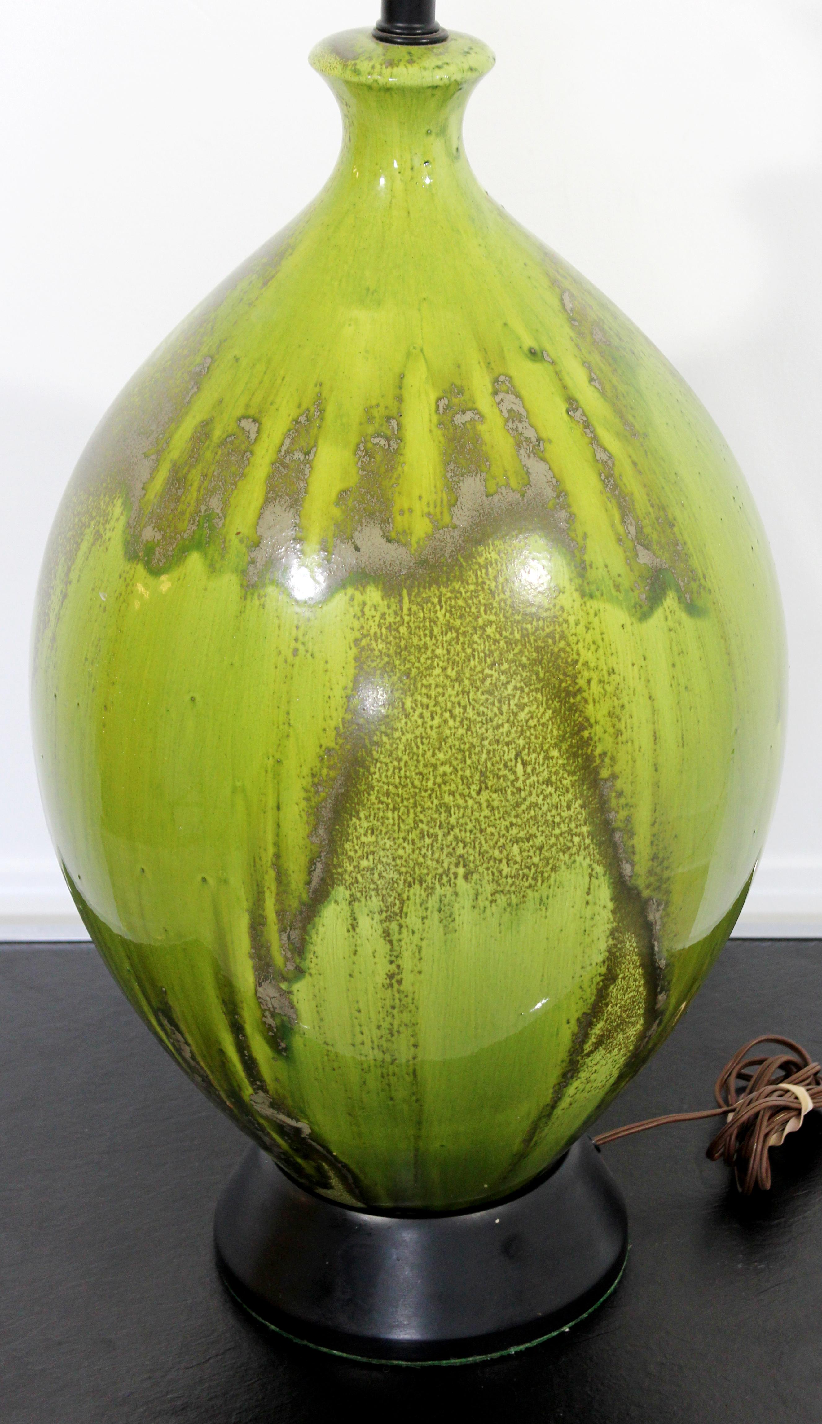 For your consideration is a fantastic, large, green ceramic, drip glaze table lamp, with its original brass finial, circa the 1970s. The dimensions are 11