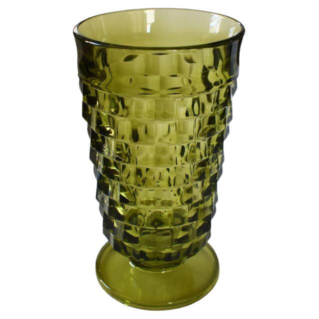 A set of eight green-faceted drinking glasses. This set will add a beautiful touch of green to any place setting. We recommend using this set for water or iced tea and pairing them with a bold tablecloth. 

Dimensions:
3.25