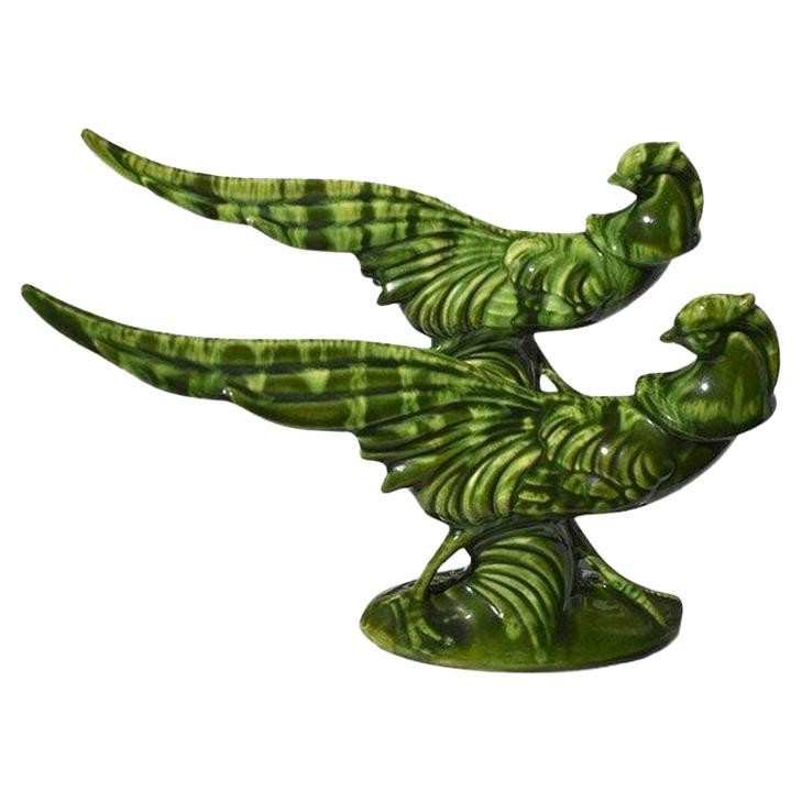 Paire de figurines d'oiseaux en glaçure verte, datant du milieu du siècle dernier