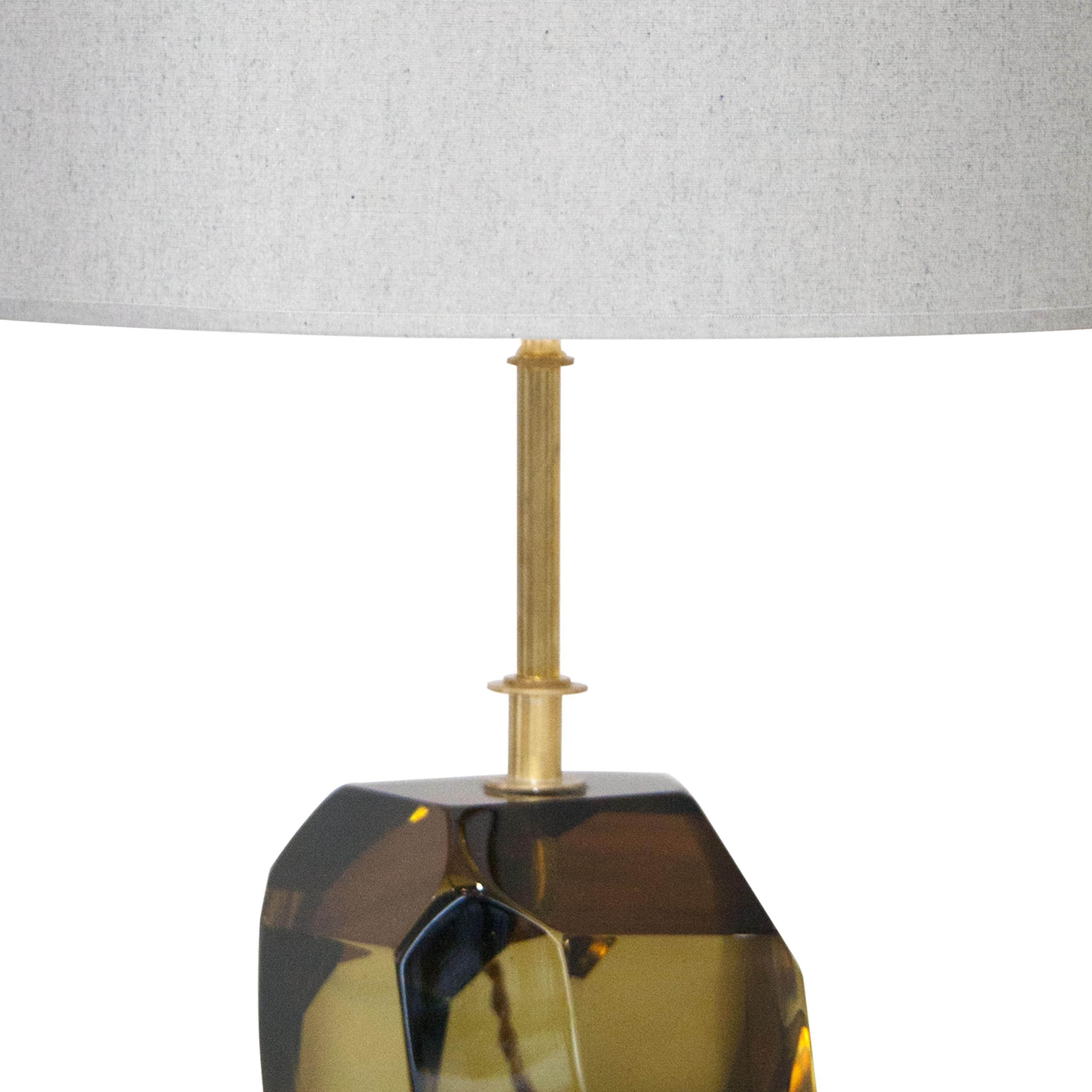 Table lamp with Murano faceted glass in translucent green and brass stem made by hand.