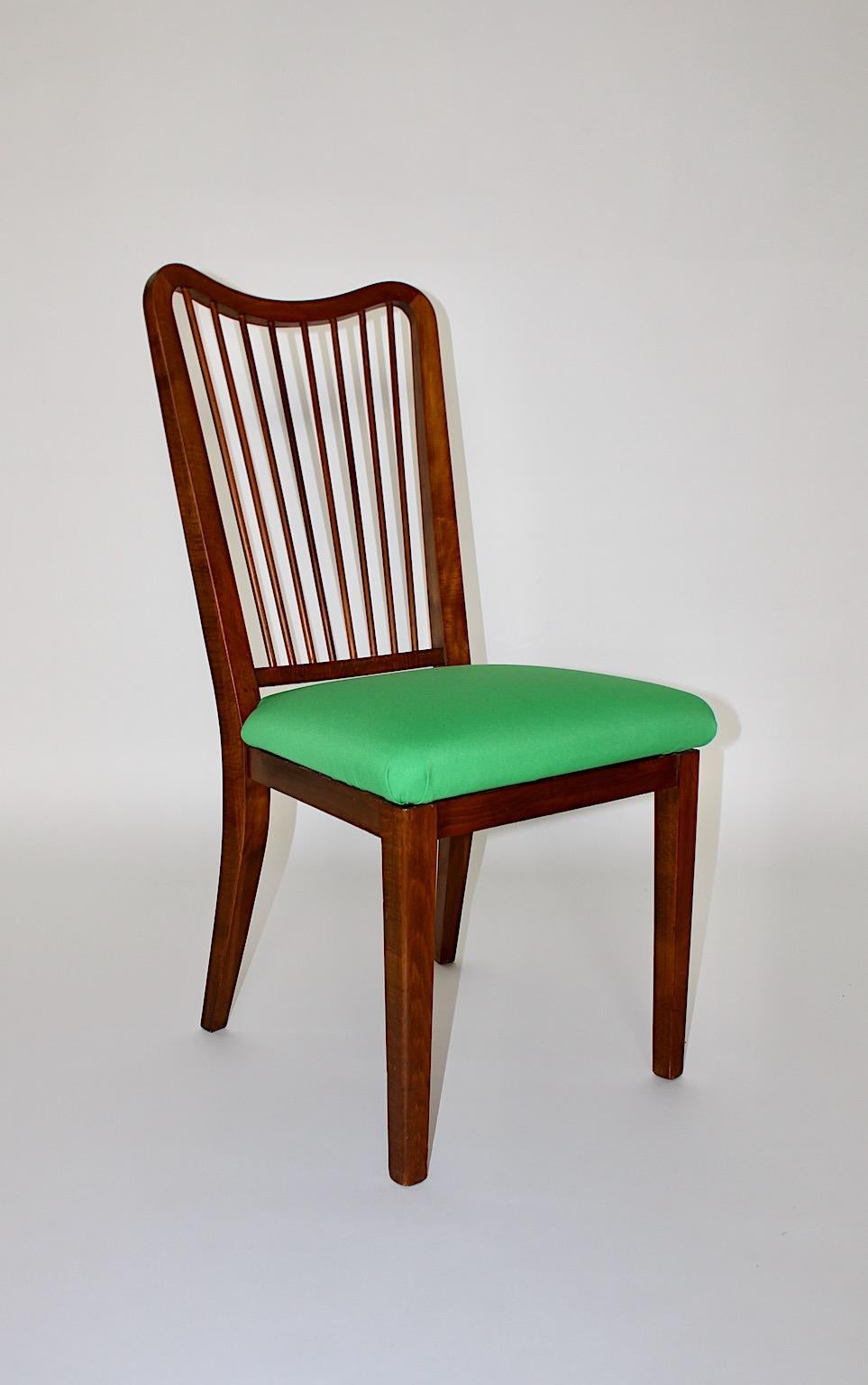 Mid-Century Modern side chair or office chair from beech with upholstery in green textile fabric 1950s Vienna.
A beautiful side chair or chair design attributed to Oswald Haerdtl from beech, walnut stained shellac polished by hand with a seat new