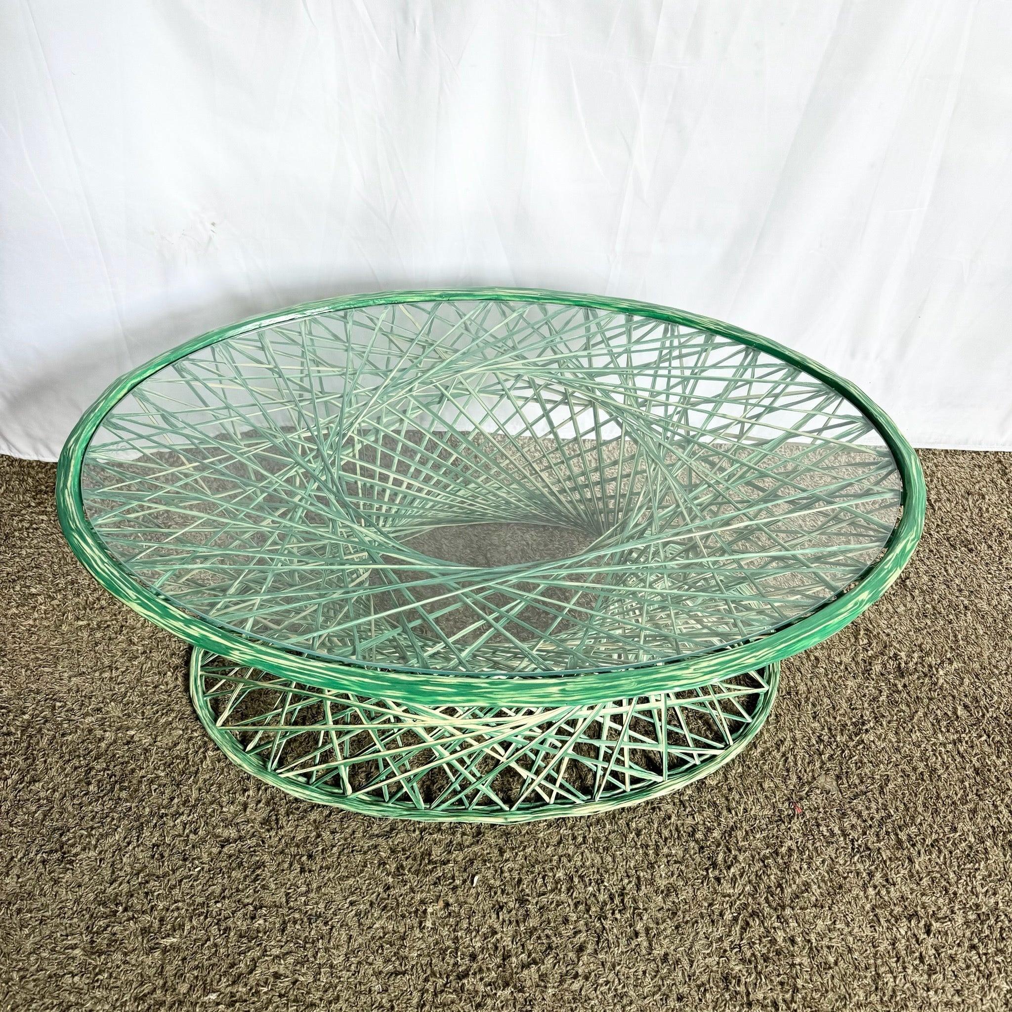 Mid-Century Modern Green Spun Fiberglass Coffee Table with glass top—adds vintage charm to indoor and outdoor spaces.​
 
 We sell items as acquired, without restoring or repairing. Vintage pieces may have age-related wear. Review photos carefully,