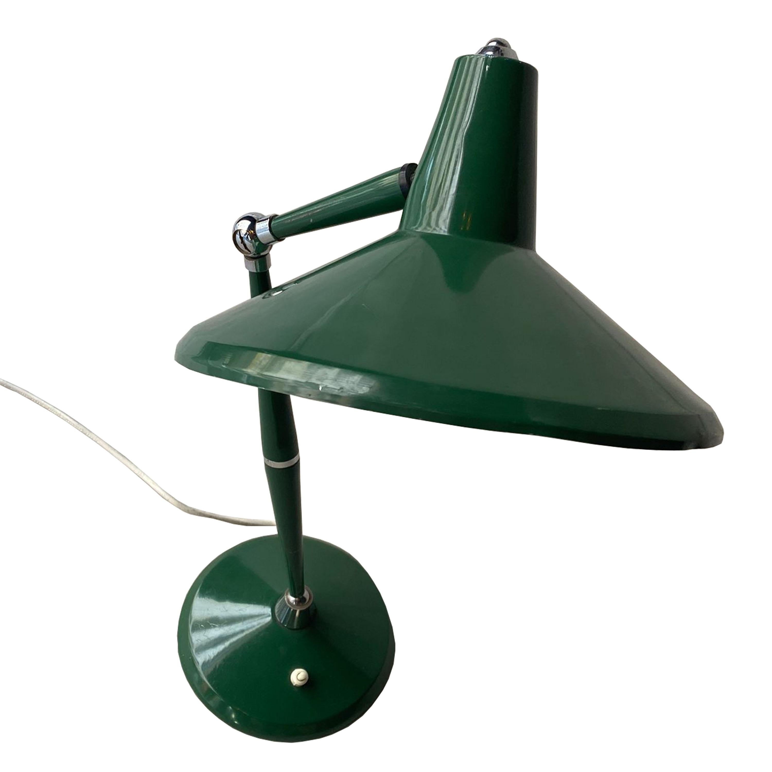 Metal circular Italian desk lamp with a green lacquered coat. Regulable and electrical button in order to turn on and off.