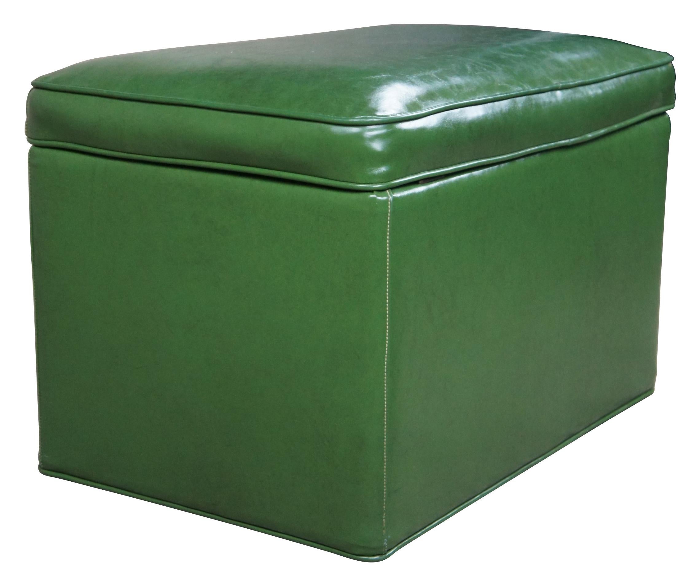 Mid Century green vinyl footstool. A rectangular form with hinged lid opening to accessory storage.