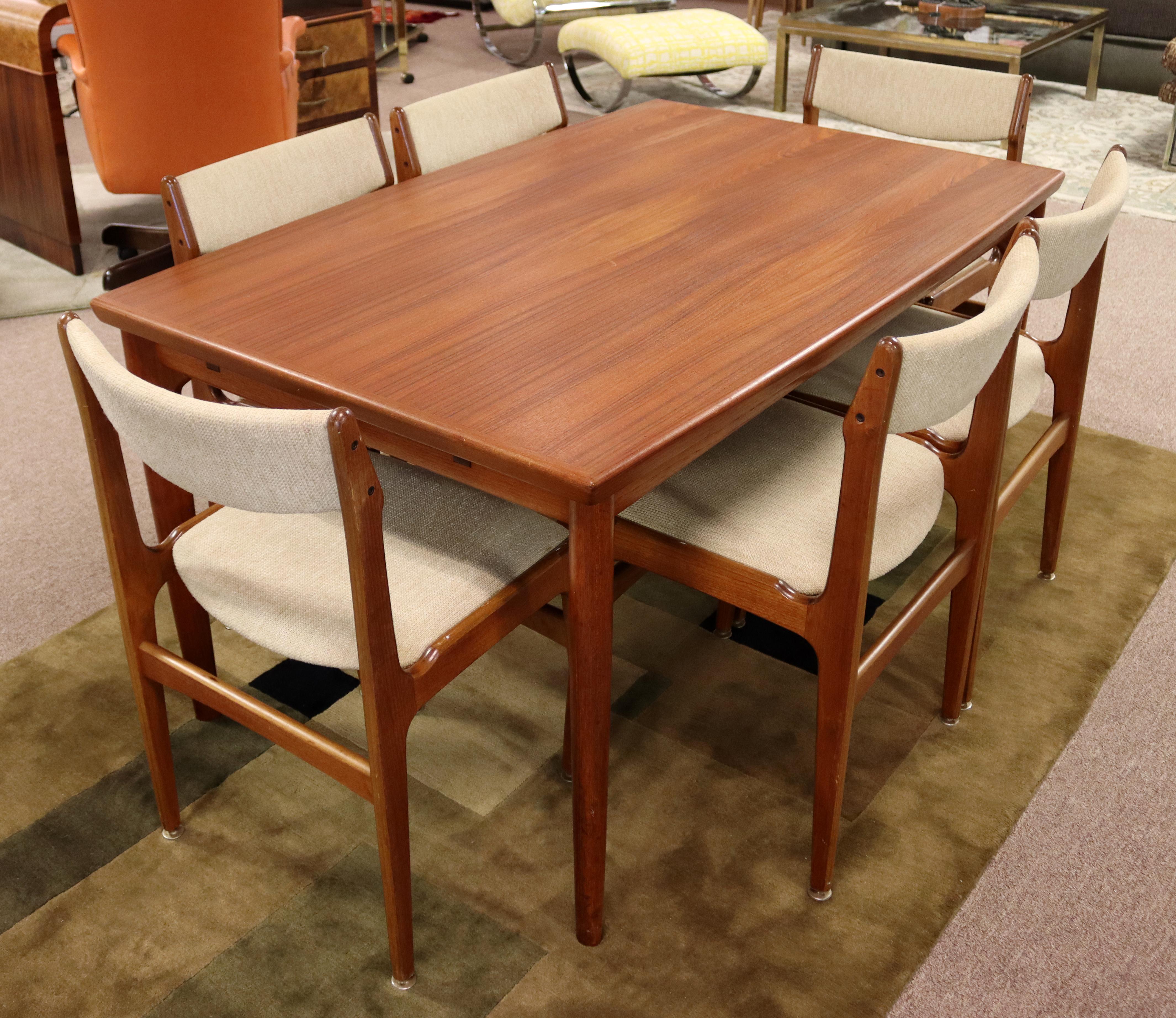 For your consideration is an outstanding, teak dining set, including six side chairs and extendable table, by Grete Jalk, made in Denmark, circa the 1960s. In very good vintage condition. The dimensions of the table are 55