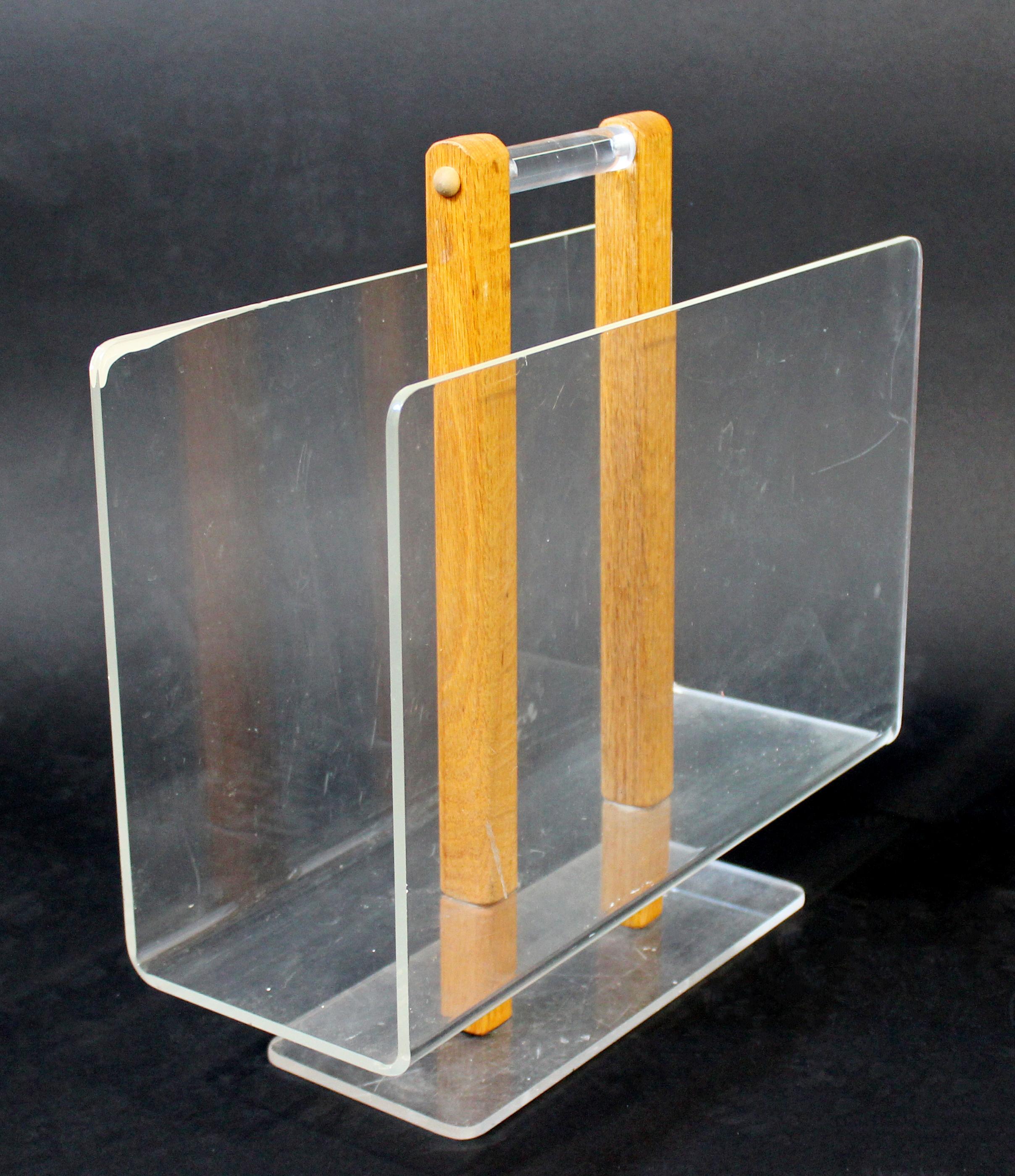 For your consideration is a delightful, dual sided, oak wood and Lucite magazine rack, by Grosfeld House, circa 1970s. In very good vintage condition. The dimensions are 16