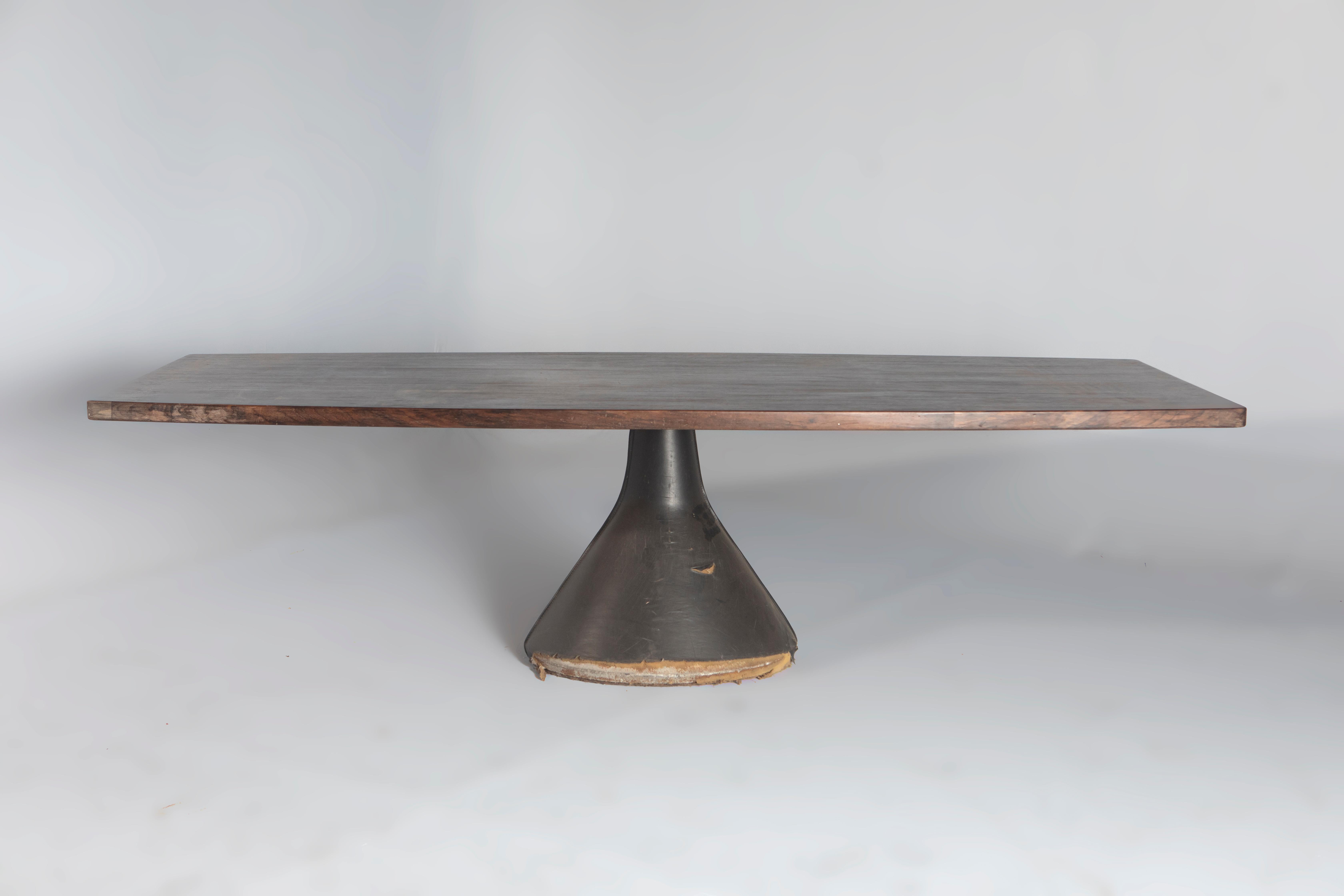 Mid-Century Modern Guanabara table by Jorge Zalszupin, Brazil, 1960s

The iconic Guanabara is a table designed by Jorge Zalszupin and produced by his company, L'atelier.
The table-top is made of wood veneer, which provides a durable and beautiful