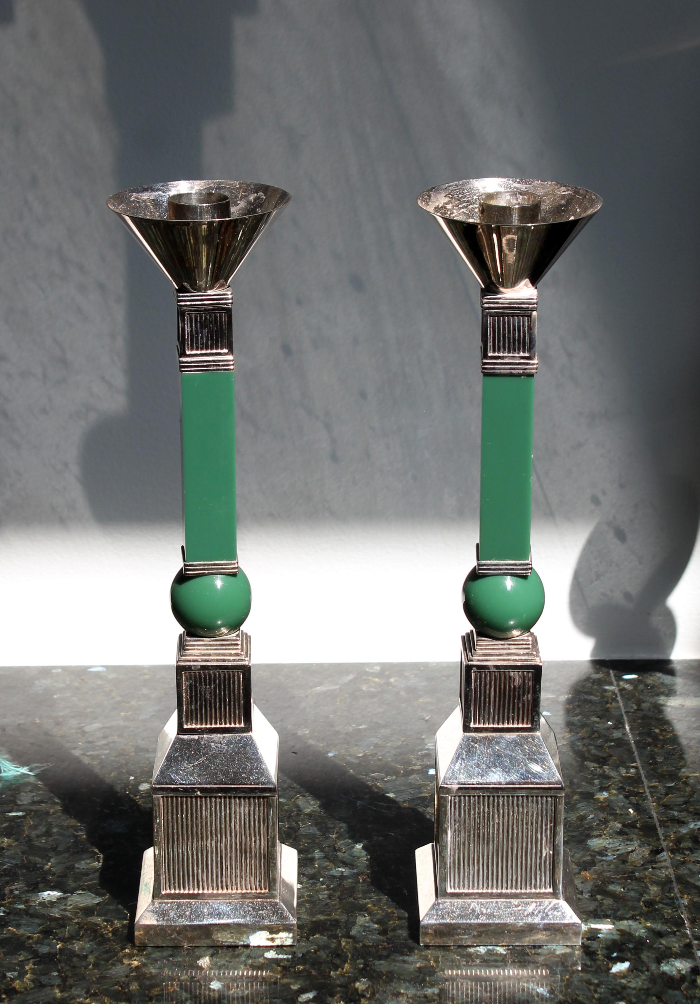 For your consideration is an incredible pair of candle sticks, made of silver plate and green resin, by Gucci, made in France, circa the 1970s. In excellent condition. The dimensions are 3
