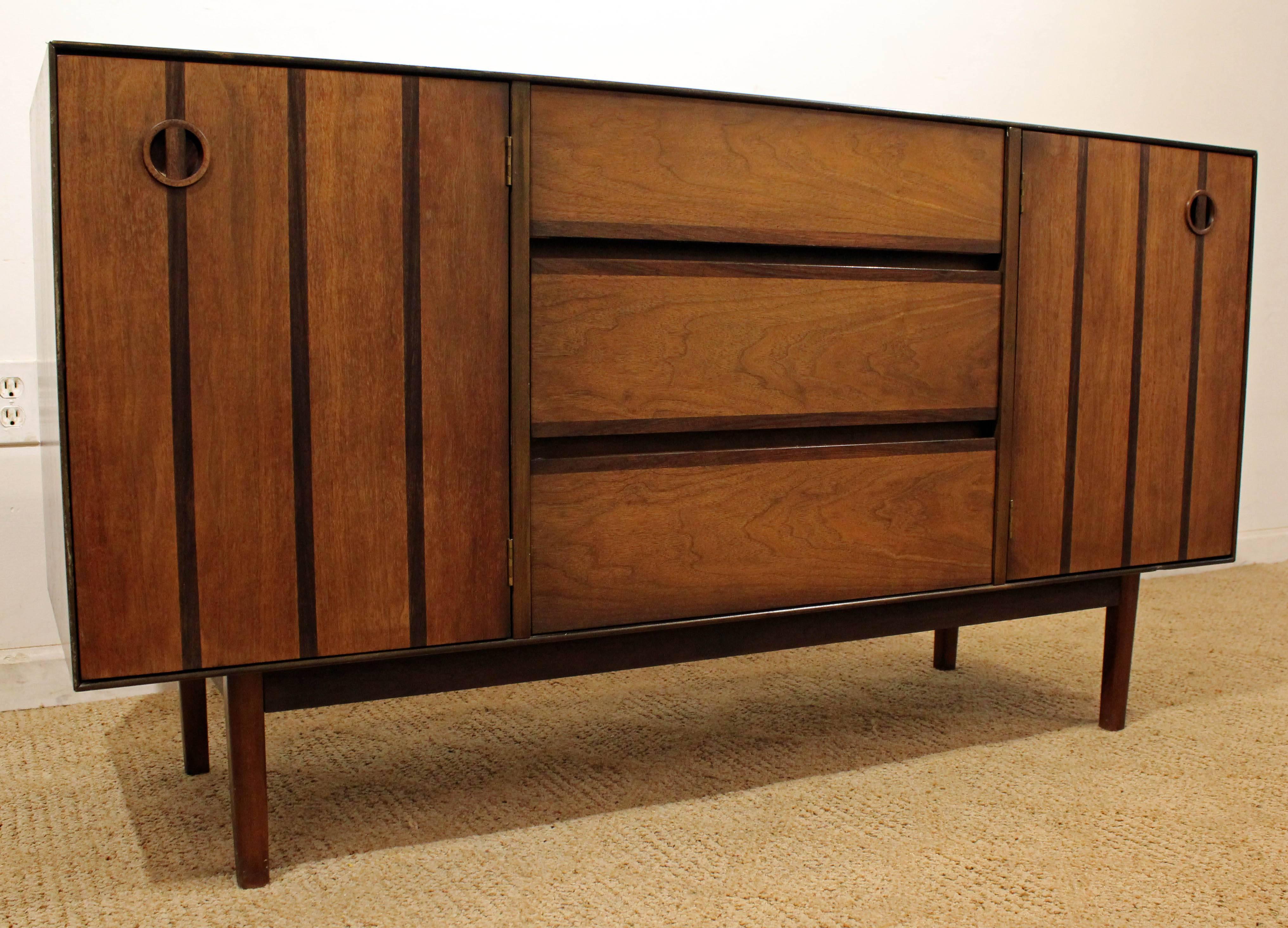 Offered is a Mid-Century Modern credenza, designed by H. Paul Browning for Stanley's 