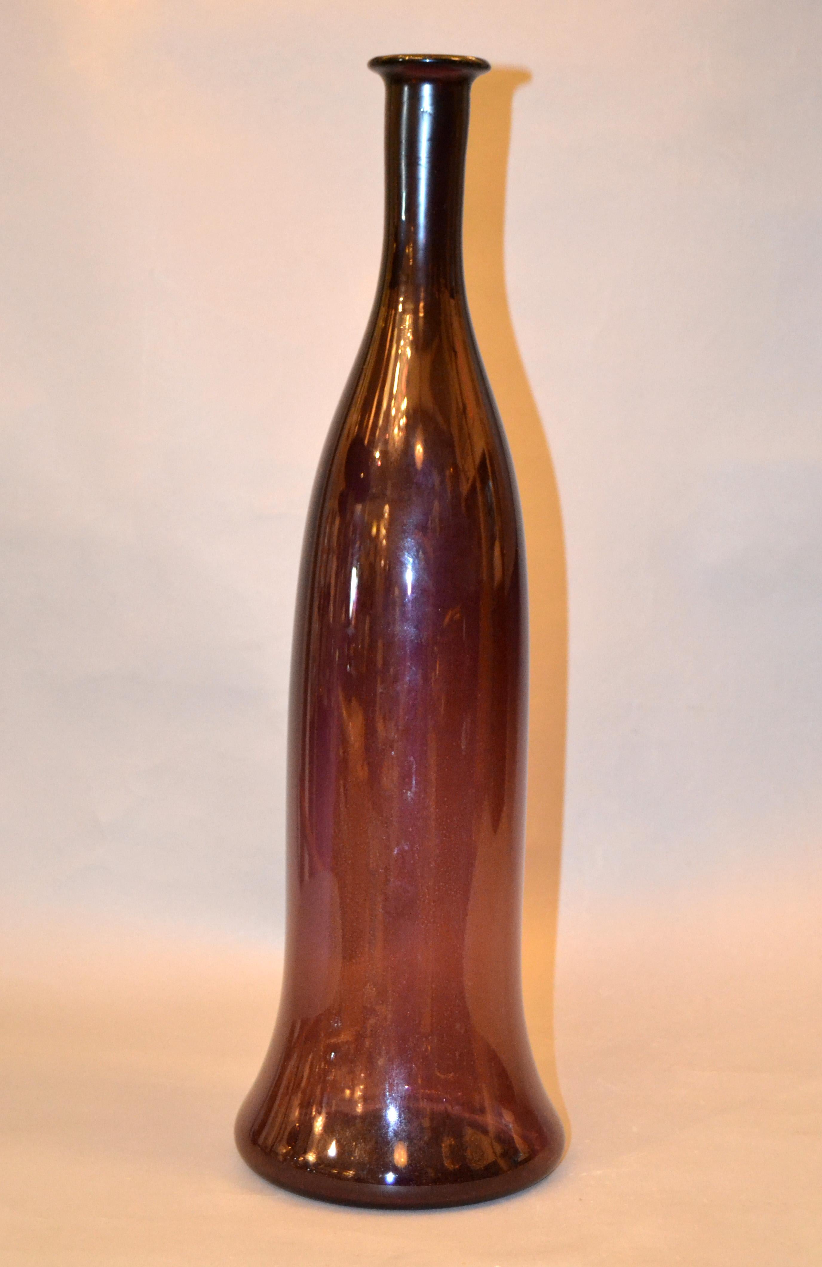 Mid-Century Modern tall blown glass vase, vessel, decanter in translucent amethyst purple.
Amethyst purple is a shade that captivates the imagination and inspires.
This vase is perfect for your home or family gathering.