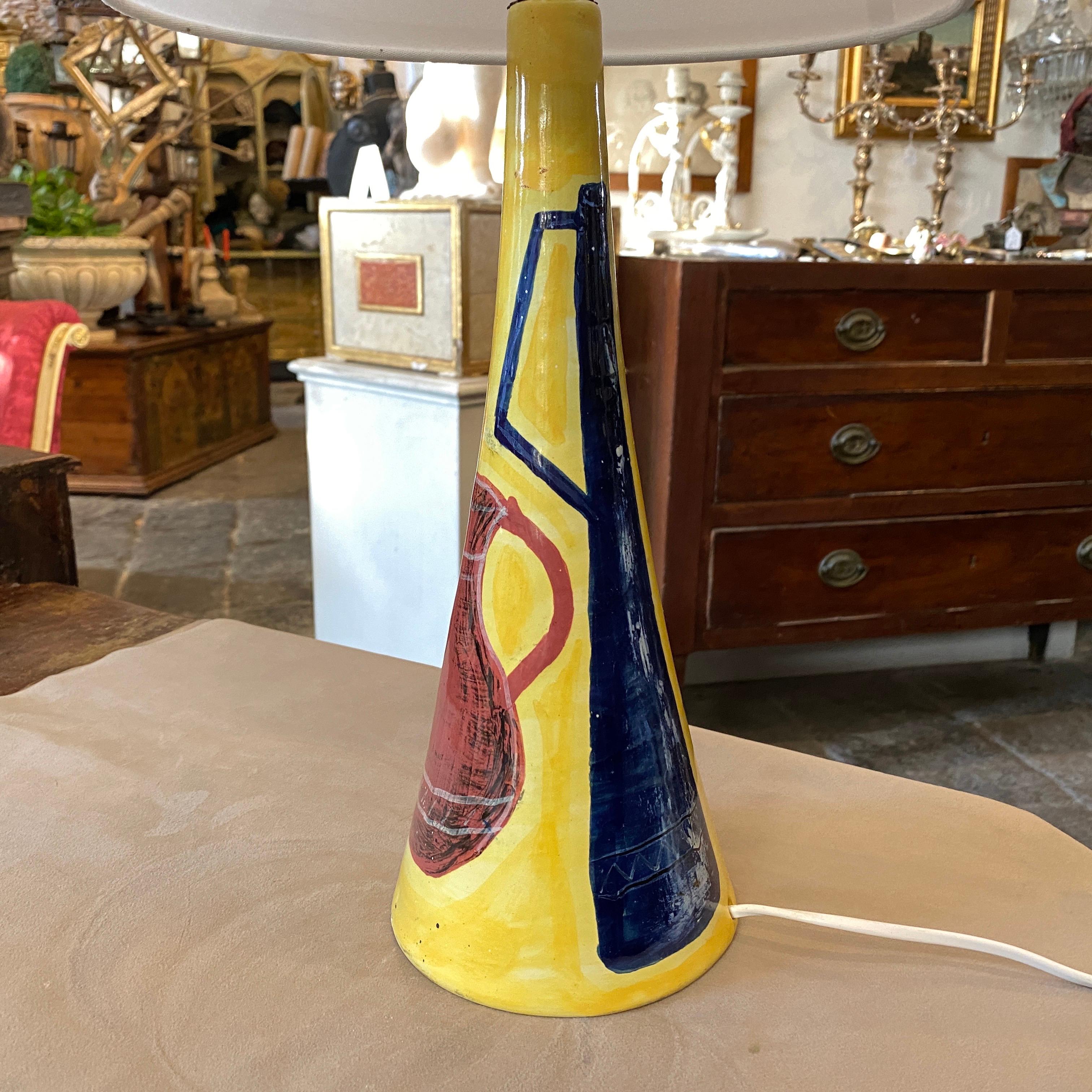 A very rare Italian table lamp made in the 1960s. It's decorated with bottle and jugs. Signed on the bottom Academia Italy, a very small Venetian factory active from the 1940s-1960s. Fully restored electrical parts, it works 110-240 volts and need a