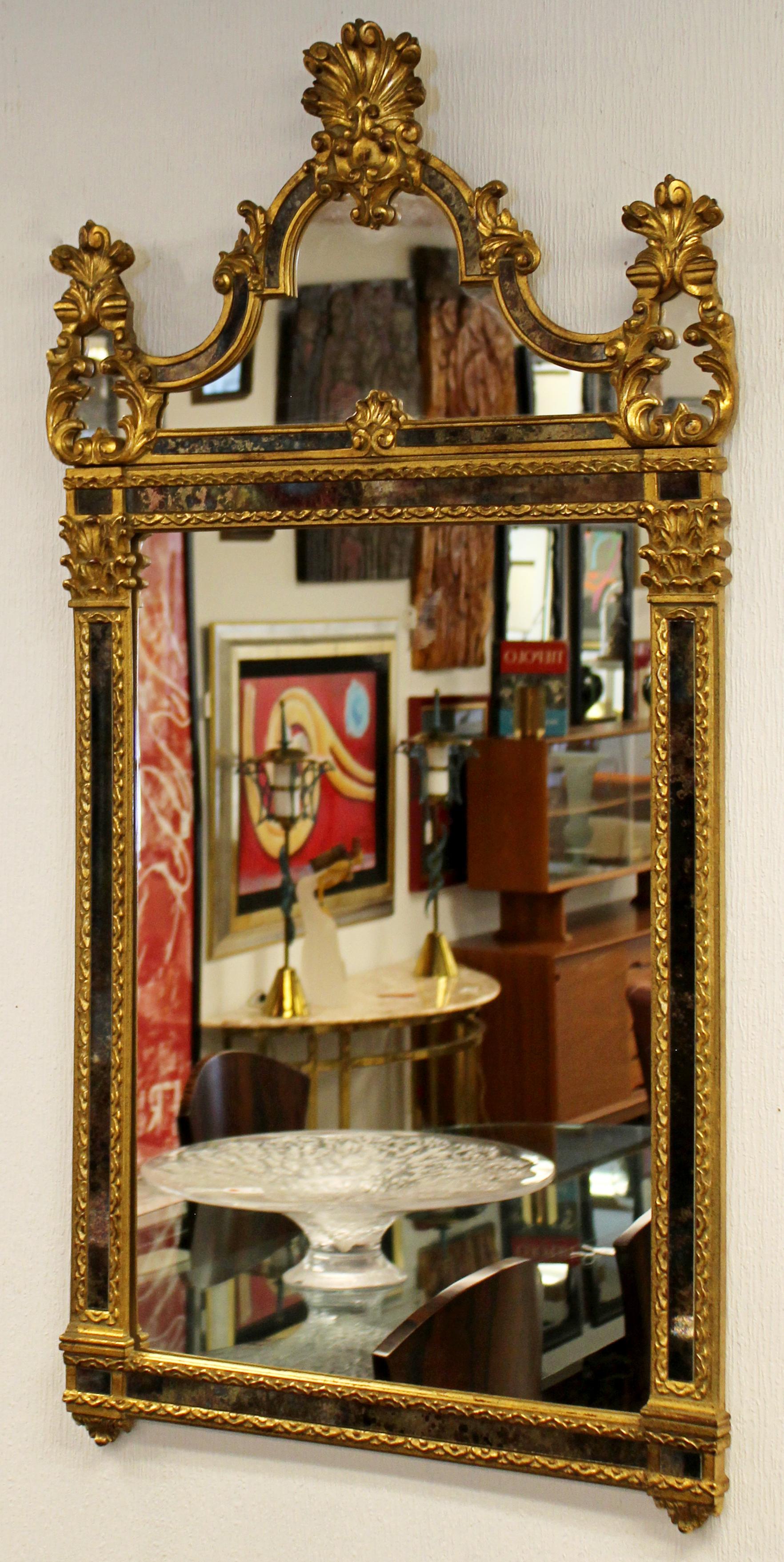 For your consideration is a regal looking, hand painted, gold giltwood wall mirror by La Barge, circa 1950s. In excellent vintage condition. The dimensions are 26