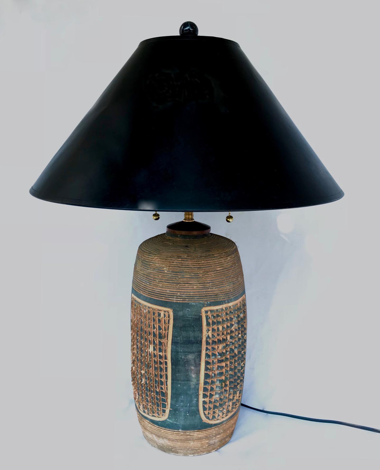 A gorgeous and rare hand thrown pottery lamp by Hal Lasky. A collectors dream. 
Sells and ships without the pictured lampshade. Recently rewired and outfitted with brass double cluster socket works. 

Puerto Rican Pottery was one of two potteries