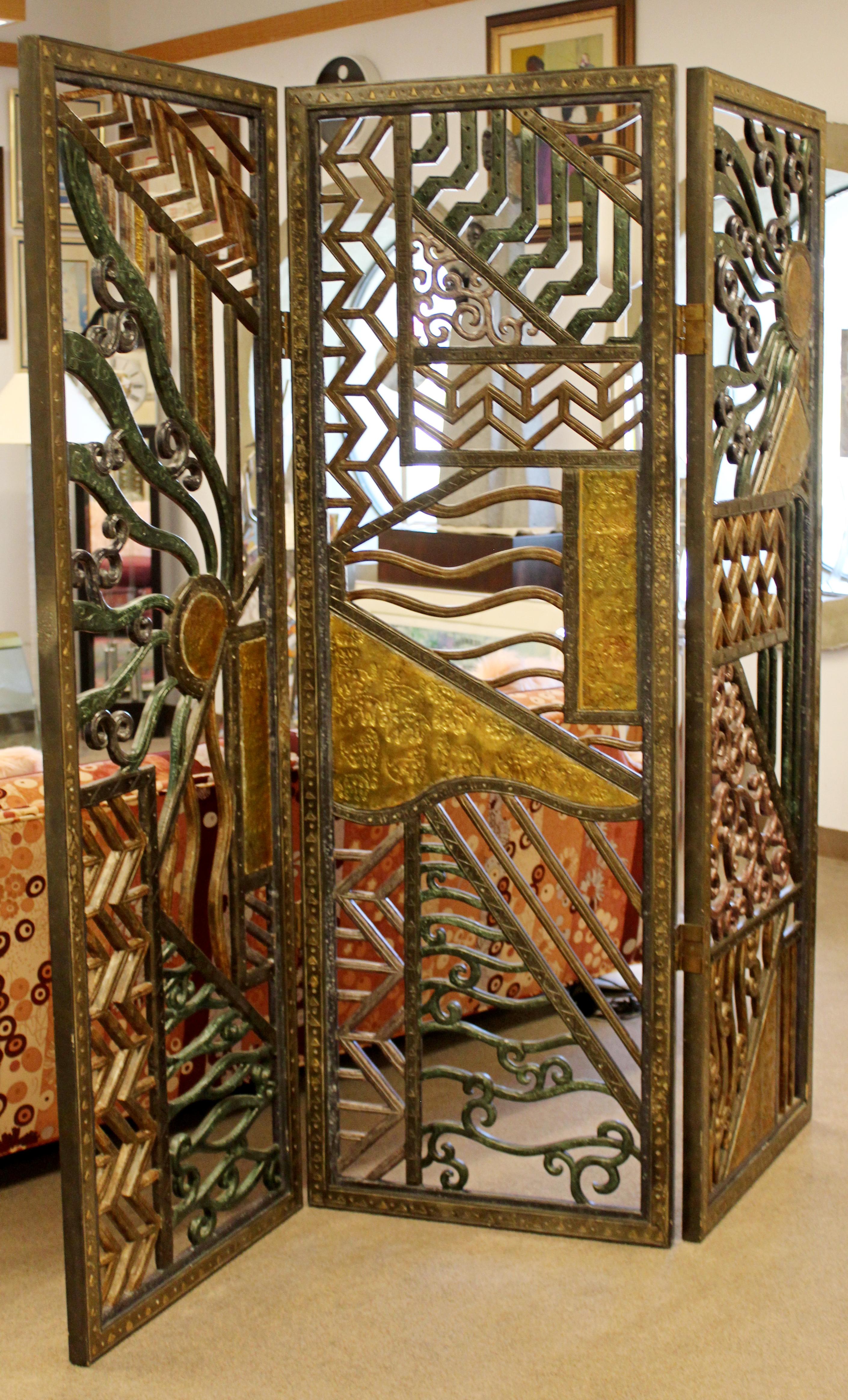 For your consideration is a fabulous, three-panel, free standing room divider screen, made of hand tooled metal. In excellent condition. The dimensions are 72.5