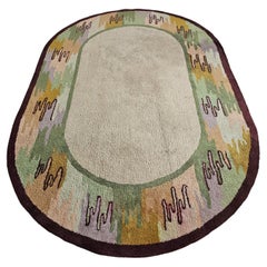 Vintage Mid Century Modern Hand Tufted Oval Rug in earthy colors made in 100% wool