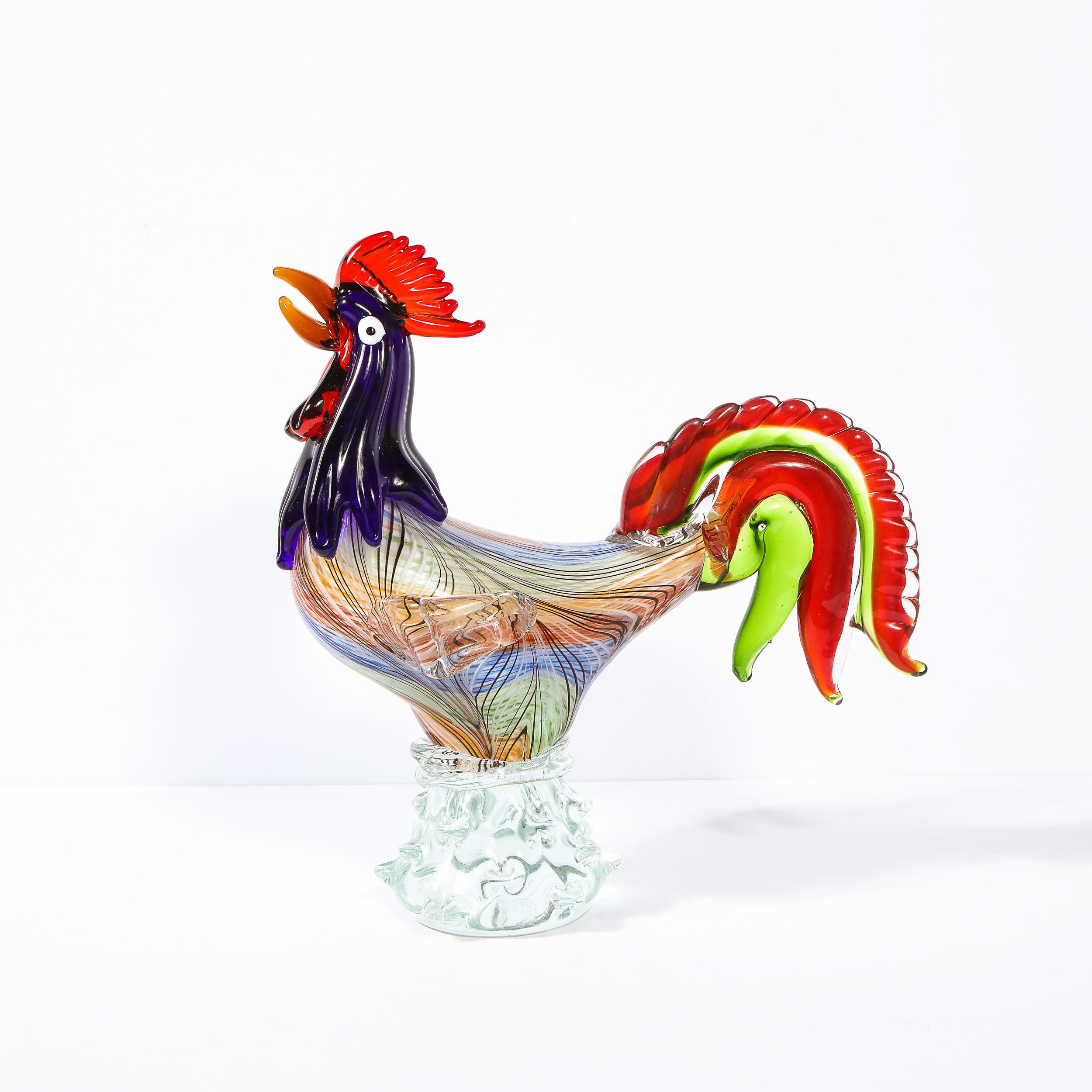 This fun and sophisticated Mid-Century Modern stylized rooster sculpture was realized in Murano, Italy- the island off the coast of Venice renowned for centuries for its superlative glass production- circa 1950. It features a sculpture conical base
