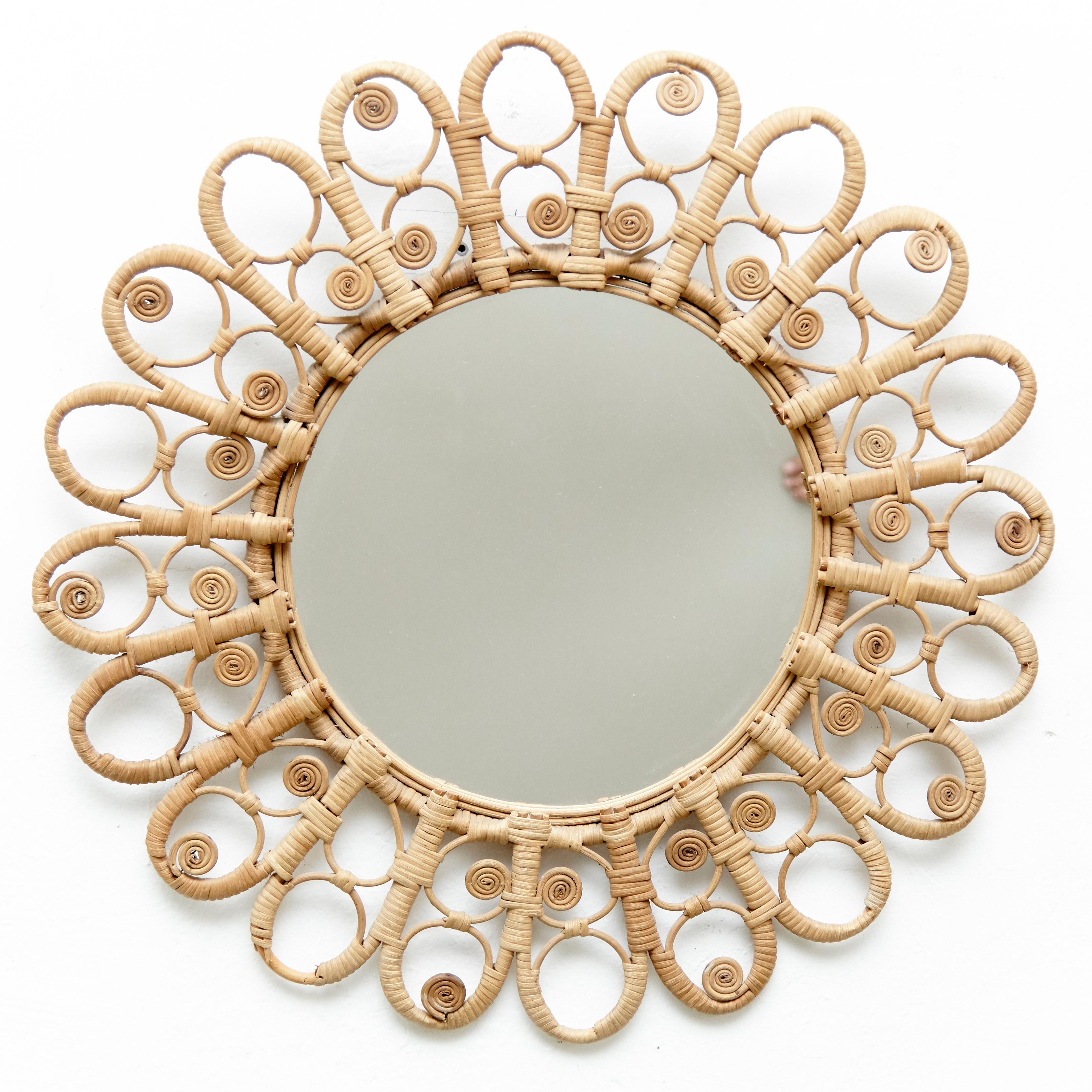 Spanish Mid-Century Modern Handcrafted Rattan Peacock Sunburst Mirror, circa 1960