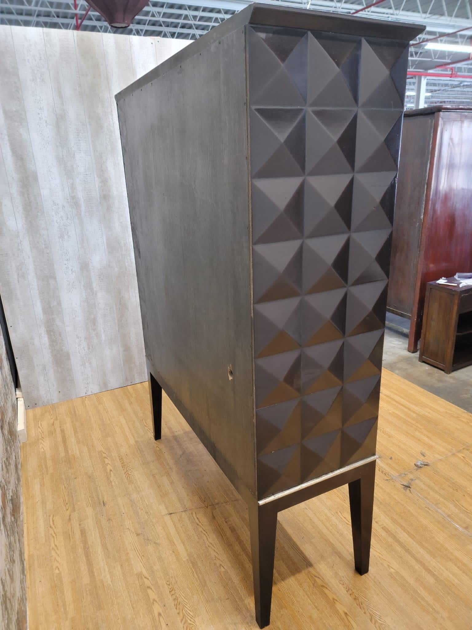 Mid-Century Modern handmade walnut cabinet with geo diamond texture

Shelves are not included with cabinet, but we can custom make them if needed. Contact us for additional info. 

Made in the USA

Circa: 1990s

Dimensions:

W 54.5