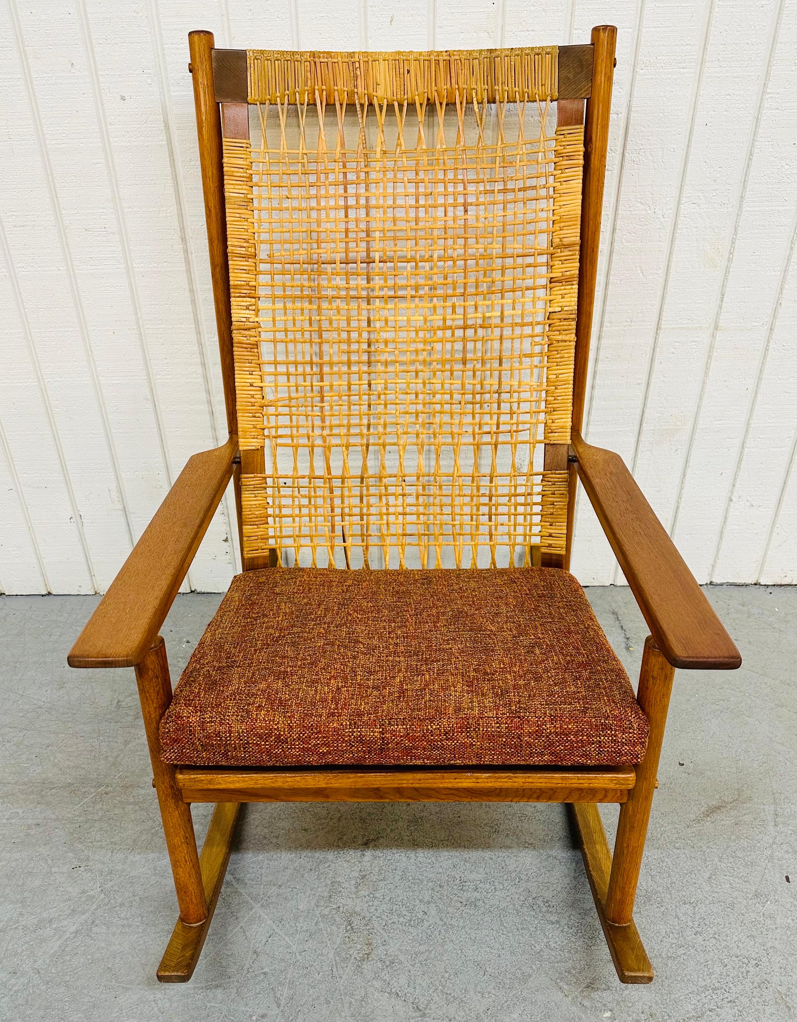 This listing is for a Mid-Century Modern Hans Olsen Teak Rocking Chair. Featuring a teak frame, woven back rest, and newly upholstered cushion. This is an exceptional combination of quality and design by Hans Olsen.