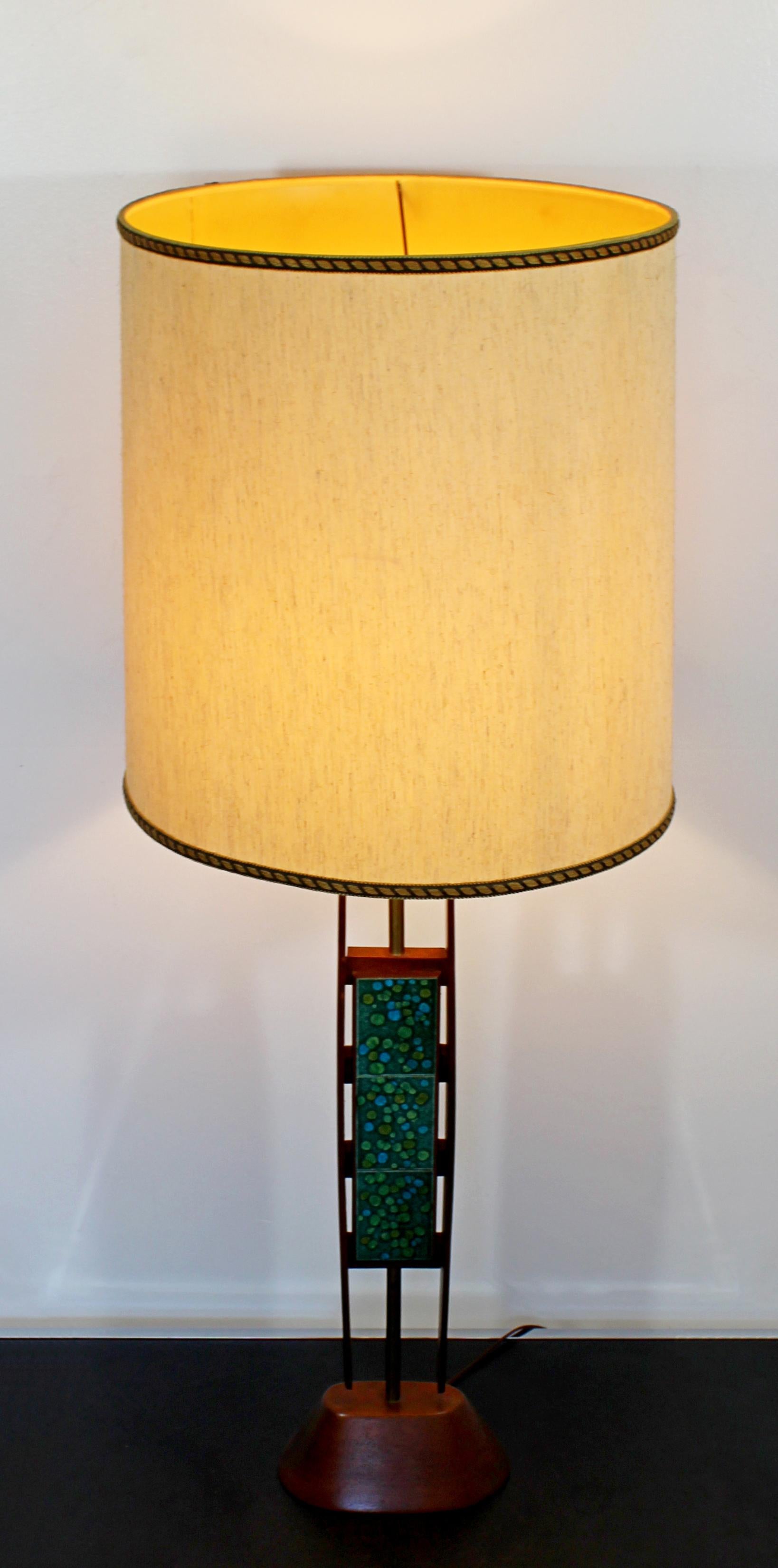 For your consideration is a stunning, teak table lamp, with a blue green enamel design, circa the 1960s. In excellent condition. The dimensions of the shade are 16