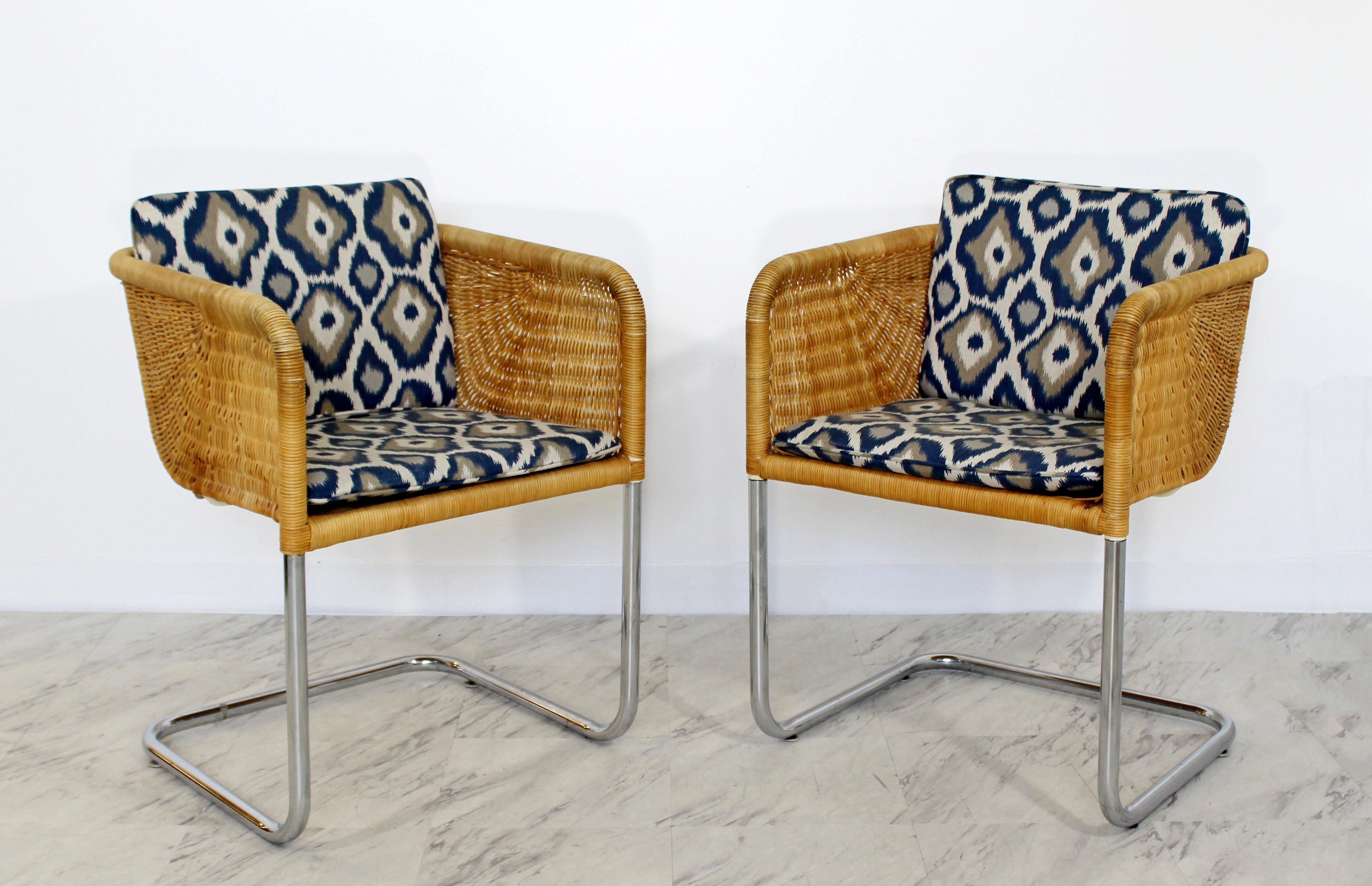 For your consideration is a fabulous, set of four Harvey Probber bucket dining armchairs, made of wicker and chrome, circa the 1960s. In very good condition. The dimensions are 21.5