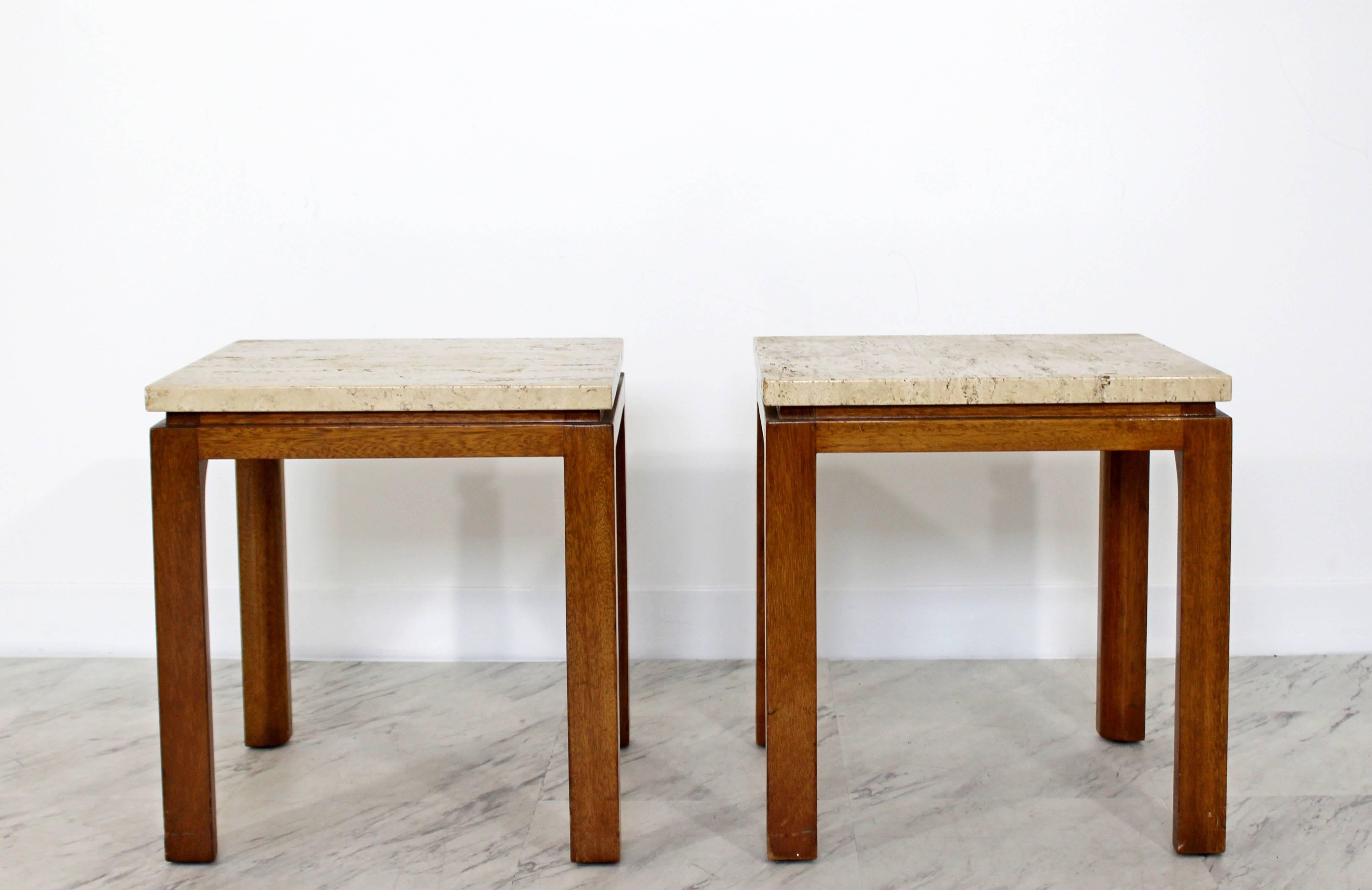 For your consideration is an incredible pair of travertine topped side or end tables, on square walnut bases, by Harvey Probber, circa 1960s. In very good condition. The dimensions of each are 16